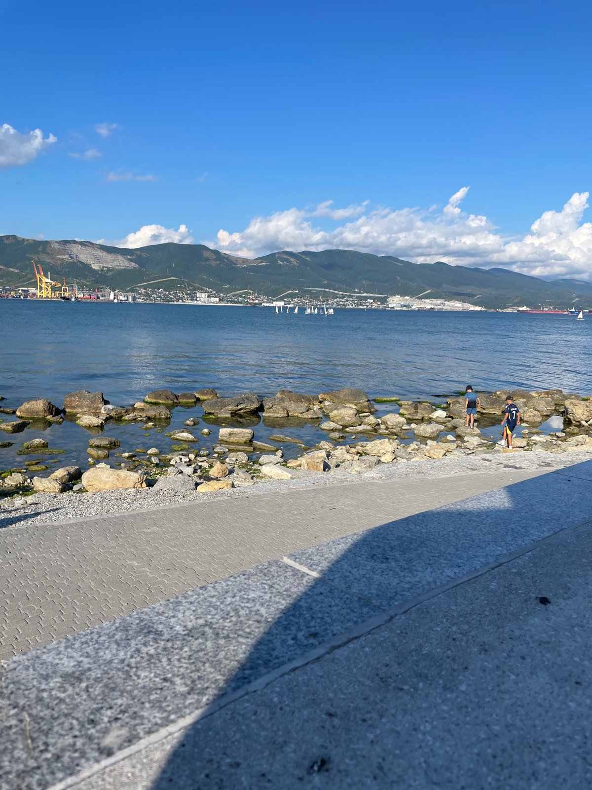 Novorossiysk harbor and coastline on a sunny afternoon