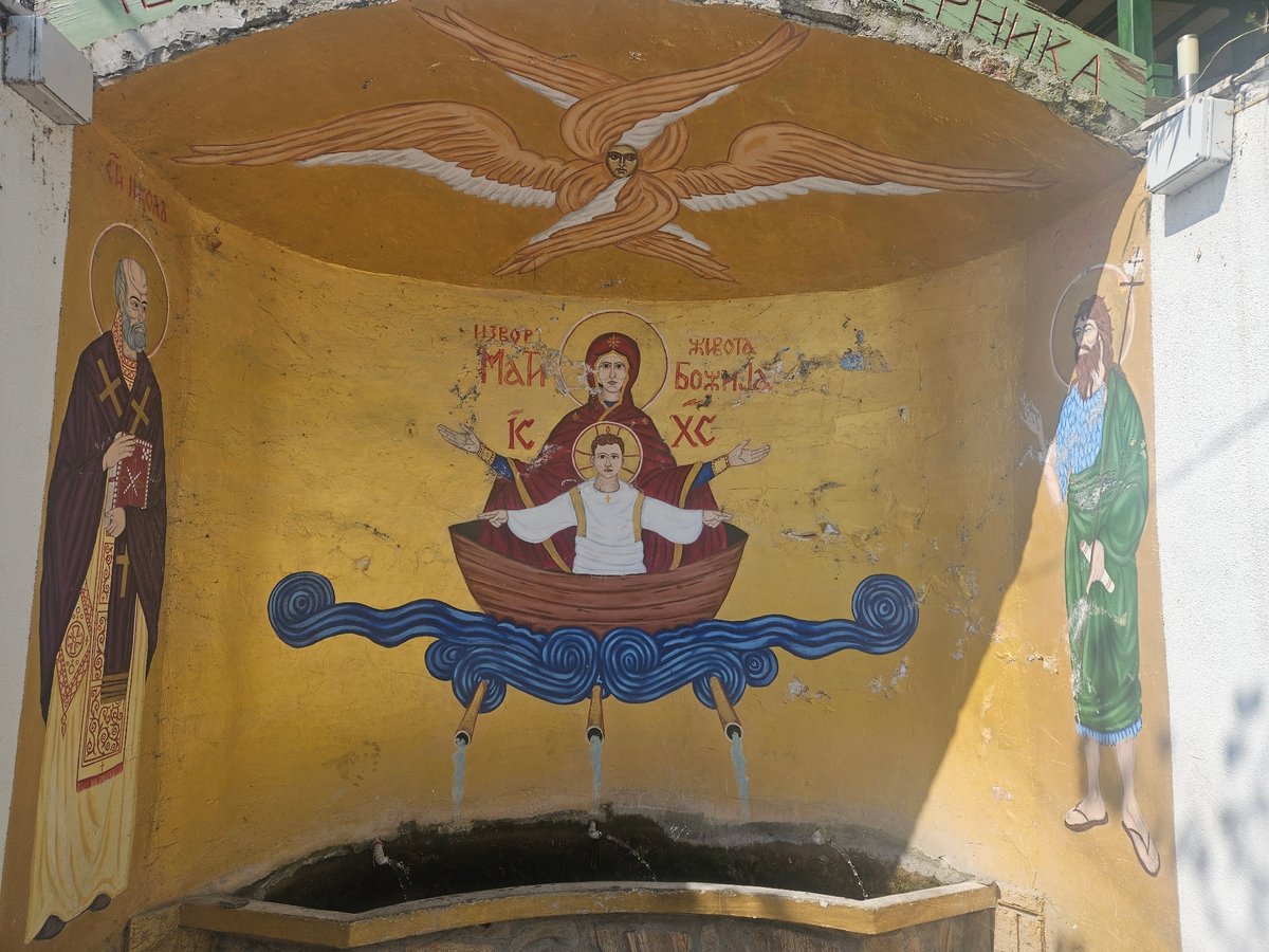 Orthodox mural and stone pathway documented in Serbian municipality