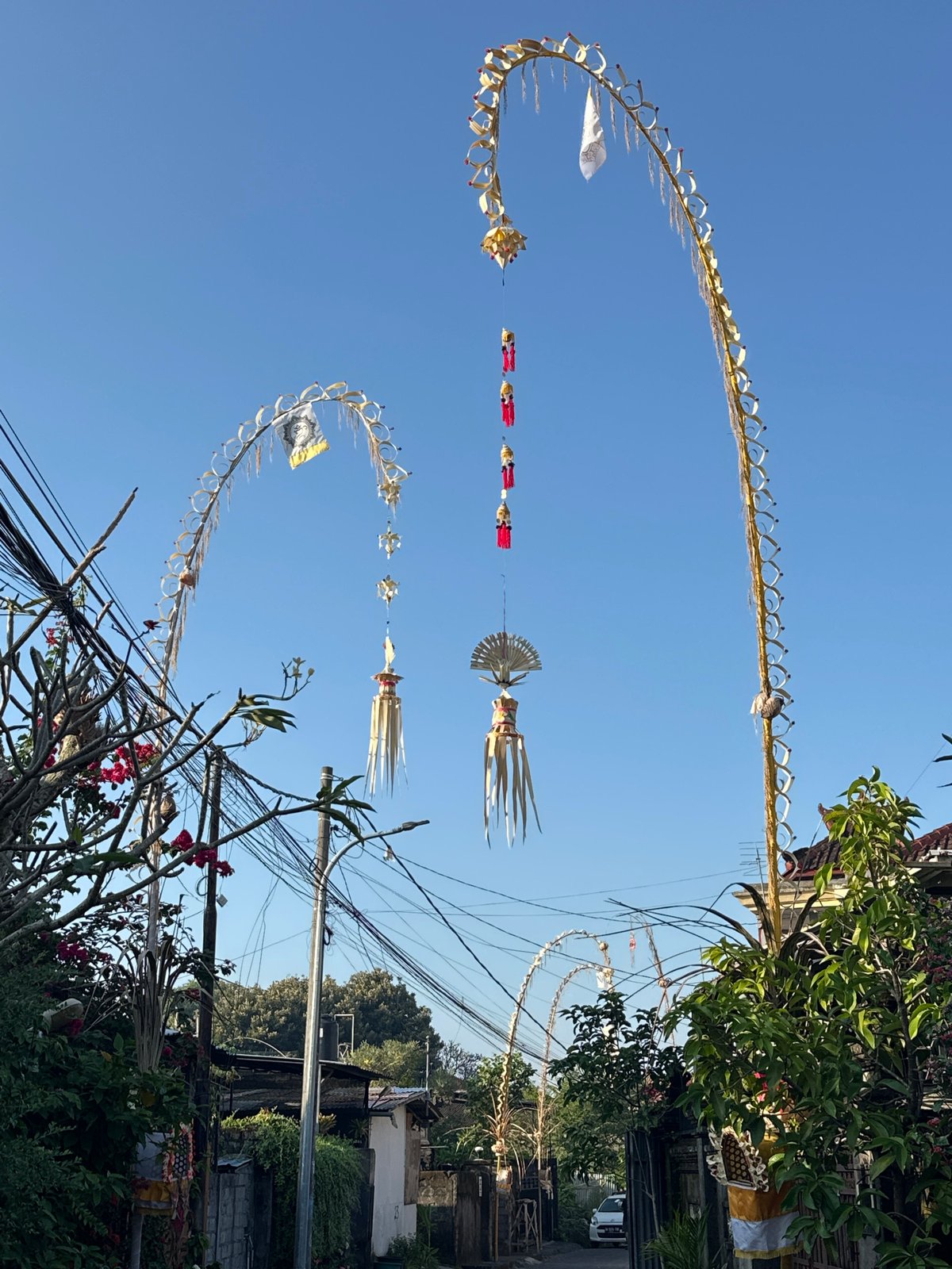 Penjor decorations line the streets of North Kuta, Bali