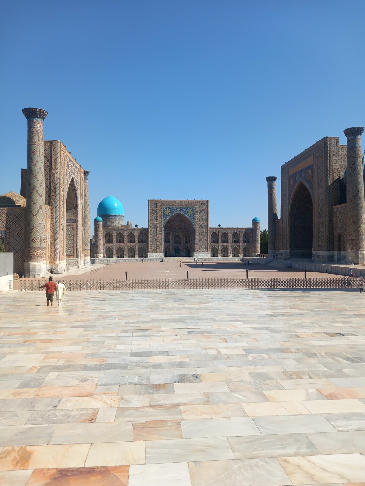 Registan Square's tiled courtyard and blue domes, Samarkand