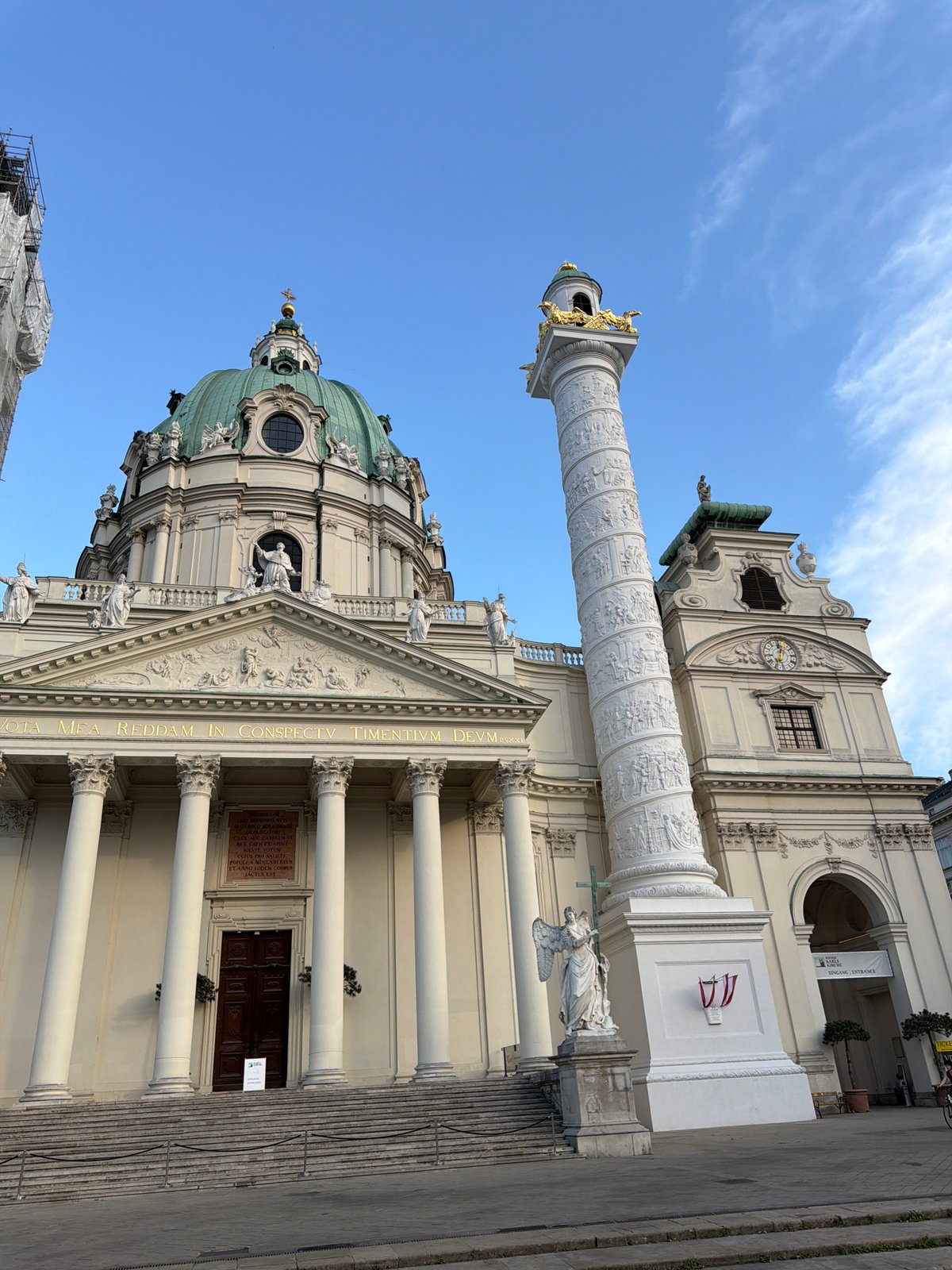 Karlskirche and Plague Column up close on a clear Vienna afternoon