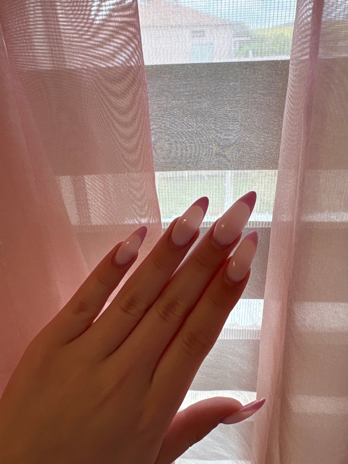 Pink French manicure documented in Bulgarovo, Bulgaria