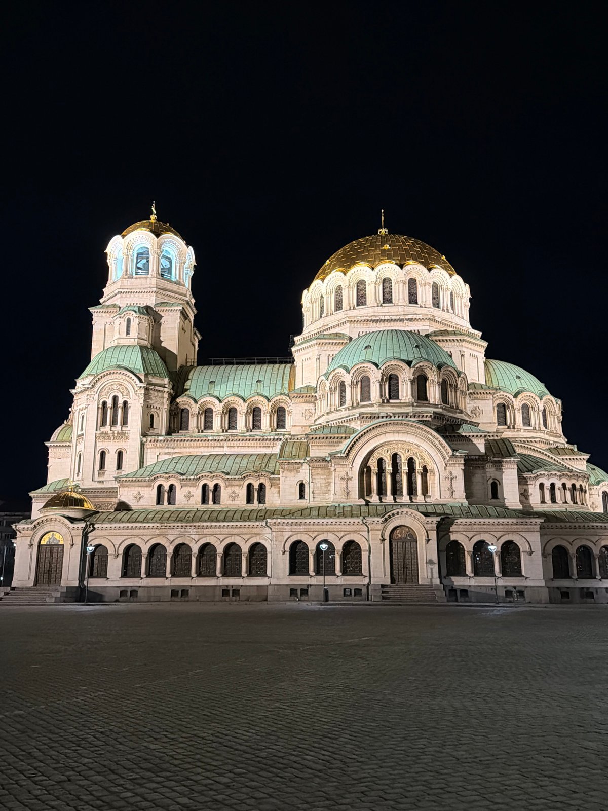 Nighttime documentation of illuminated Sofia landmarks and streets