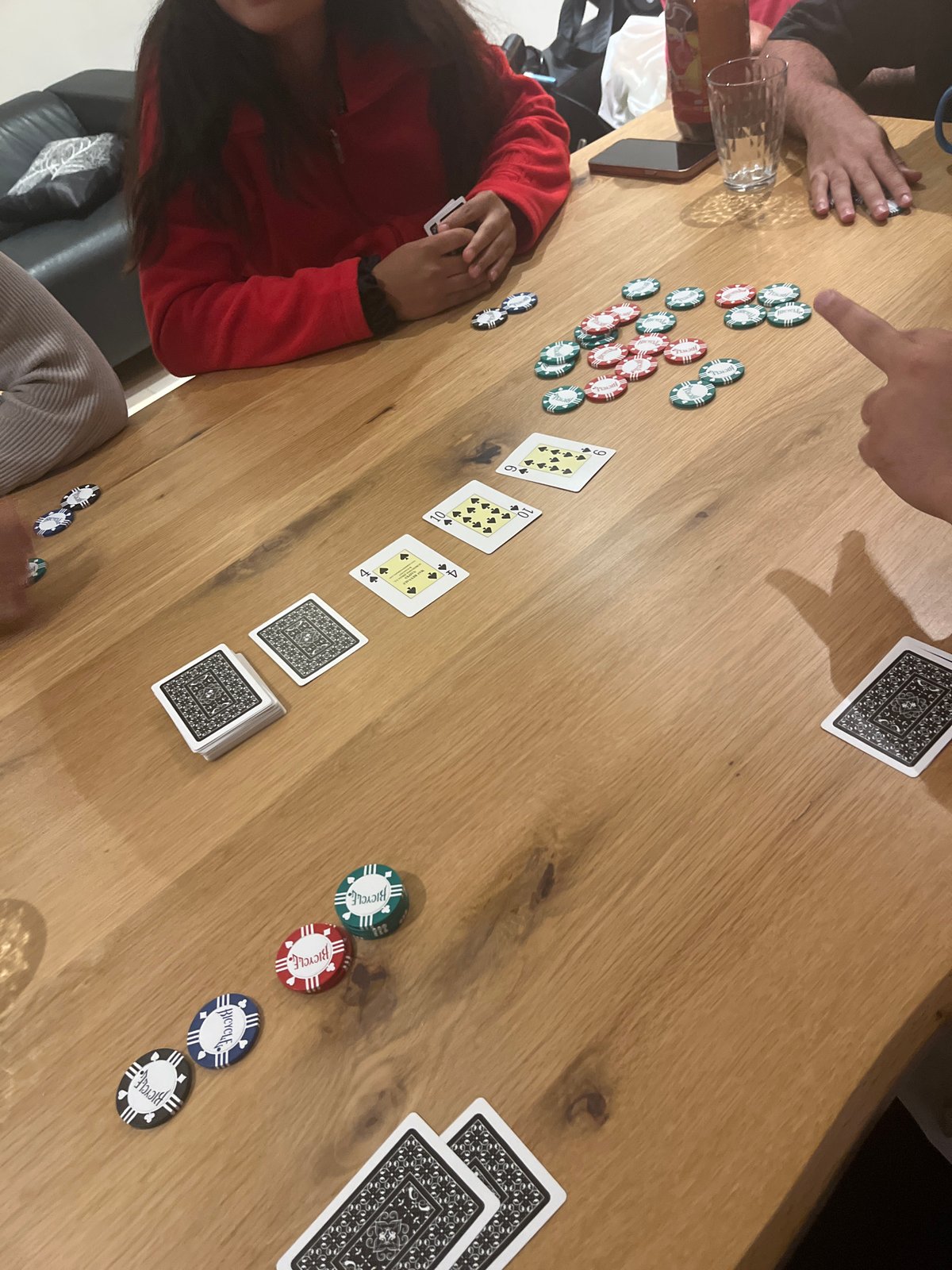 Card game with poker chips observed in Benitachell, Spain