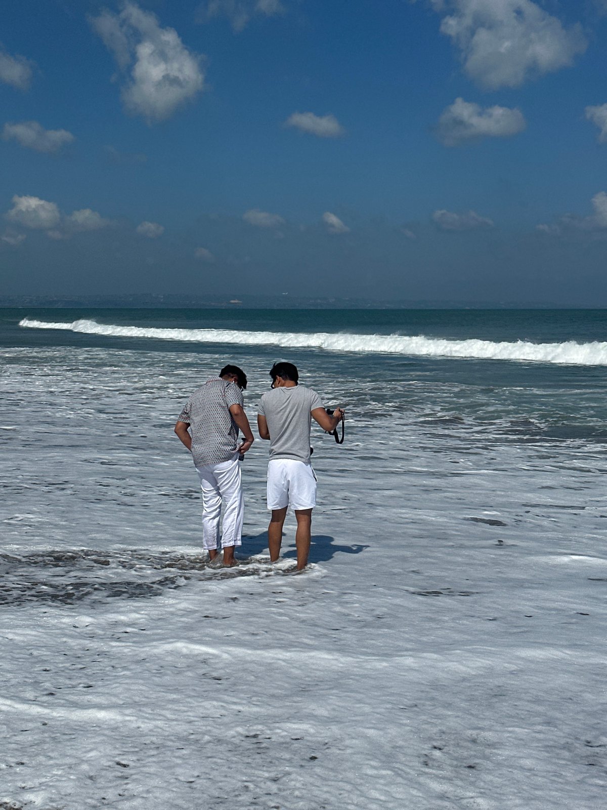 Morning beach life across Kuta's shores and vendors