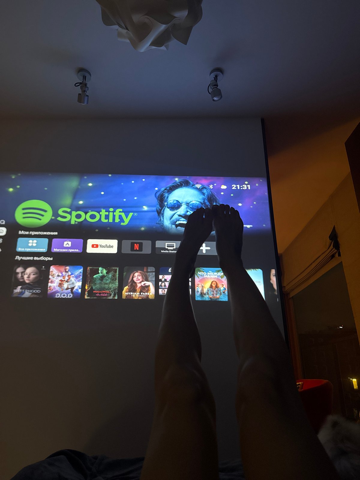 Woman relaxes with face mask in Warsaw bedroom