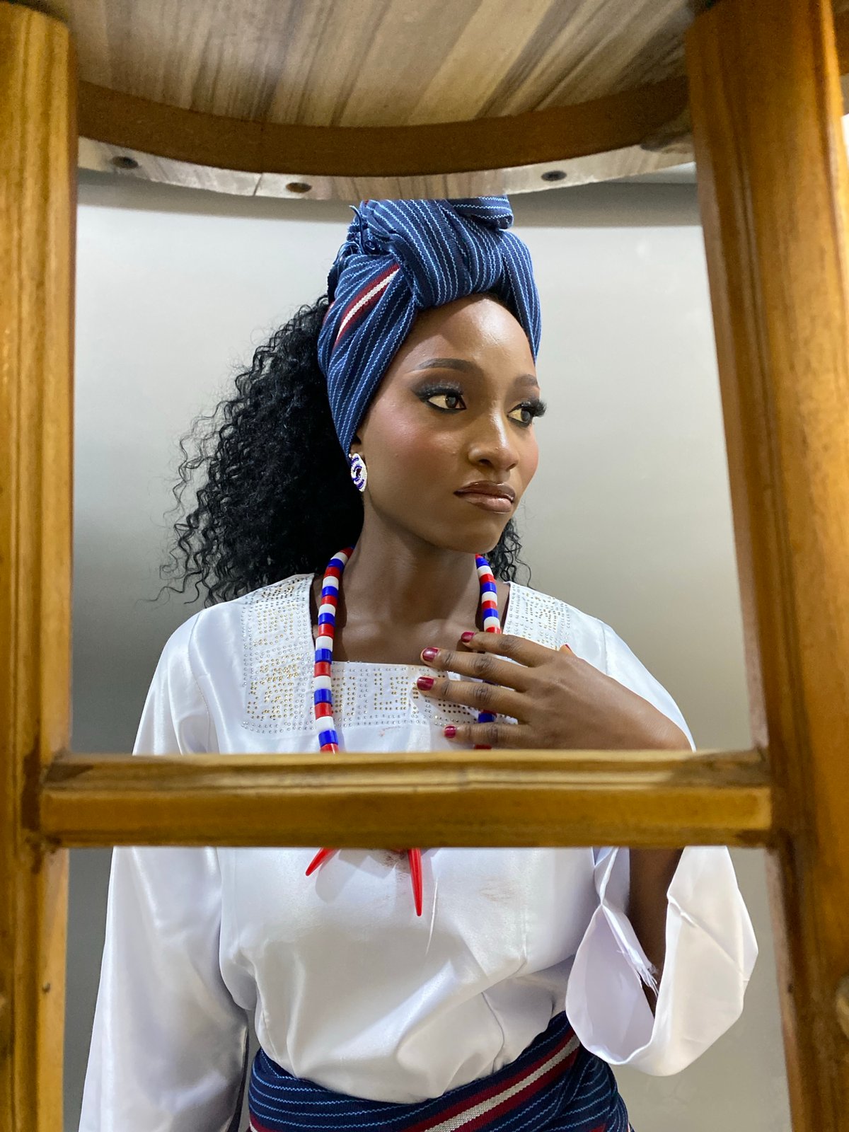 Portrait sessions and daily commerce documented in Gura Top, Nigeria