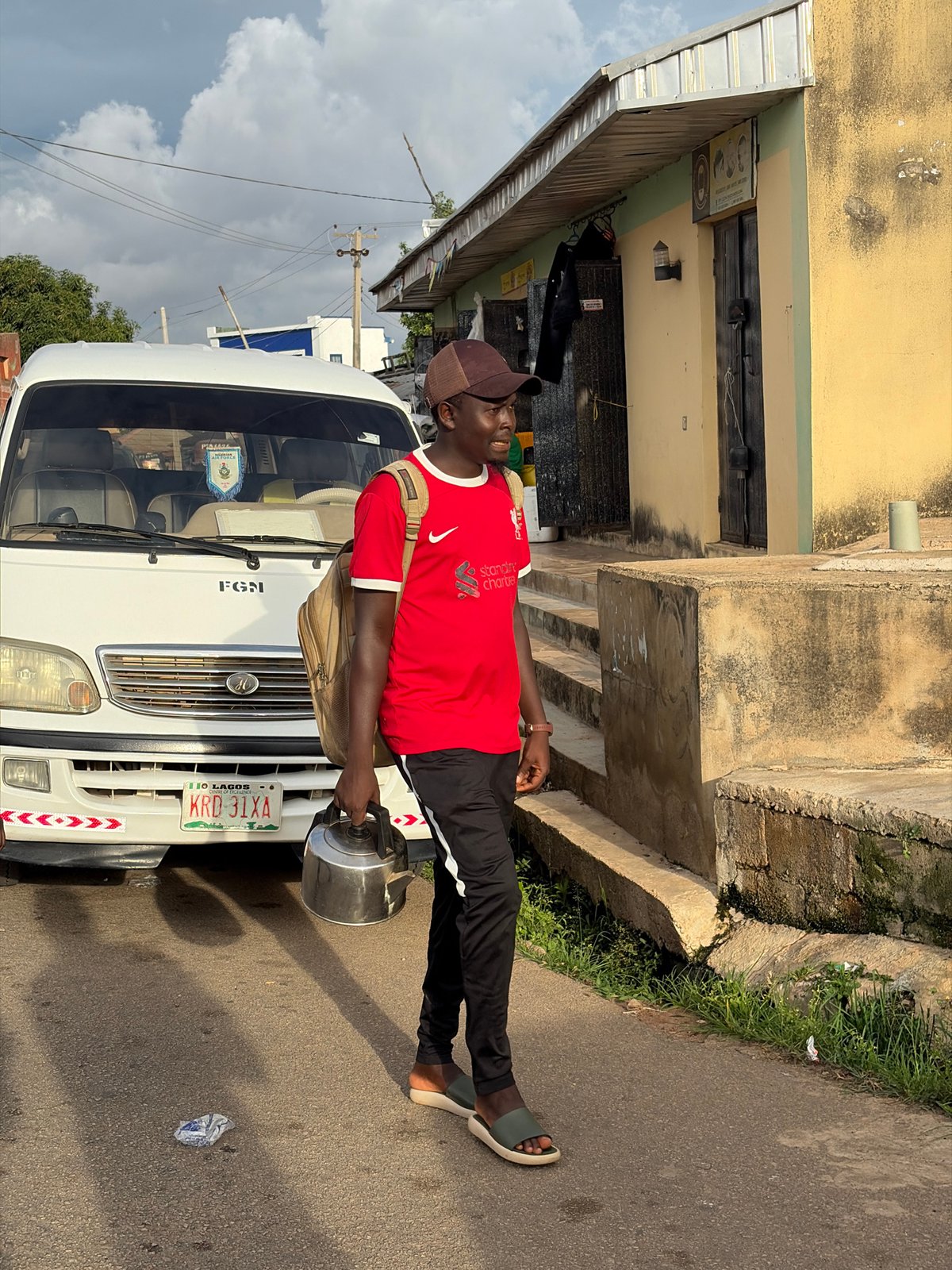 Ordinary street life documented across Jos, Nigeria neighborhoods