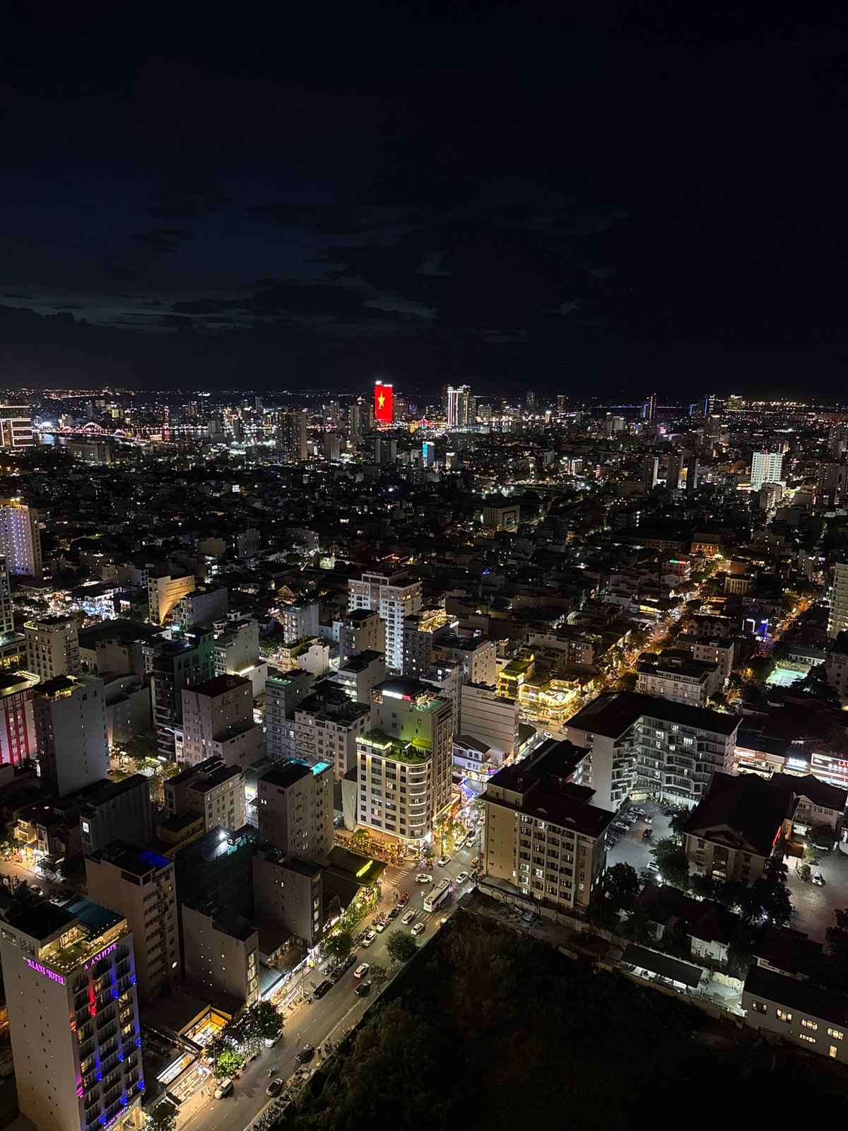 Nighttime aerial views capture bustling Đà Nẵng cityscape activity