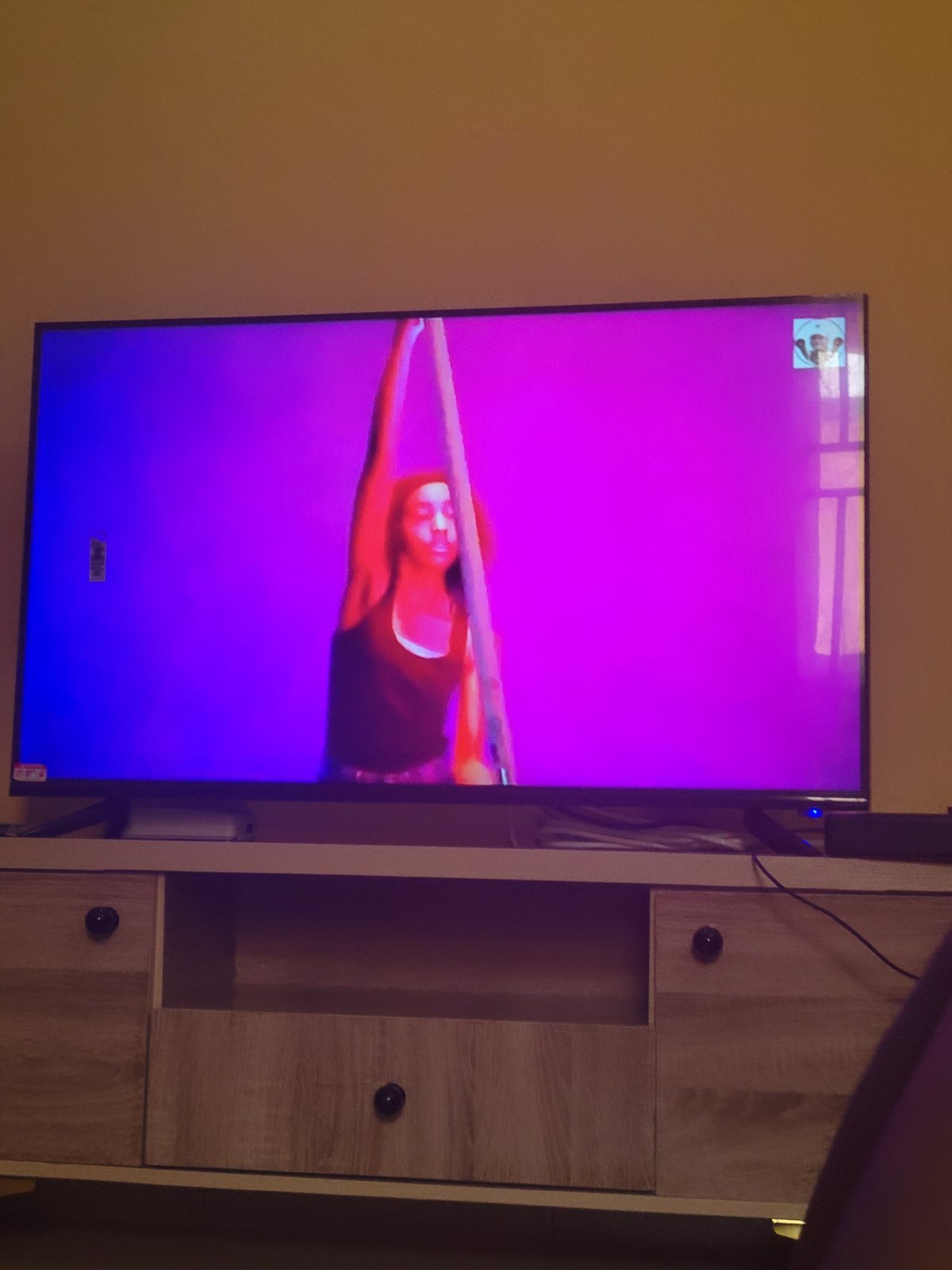 TV shows aerial acrobatics performance in domestic setting