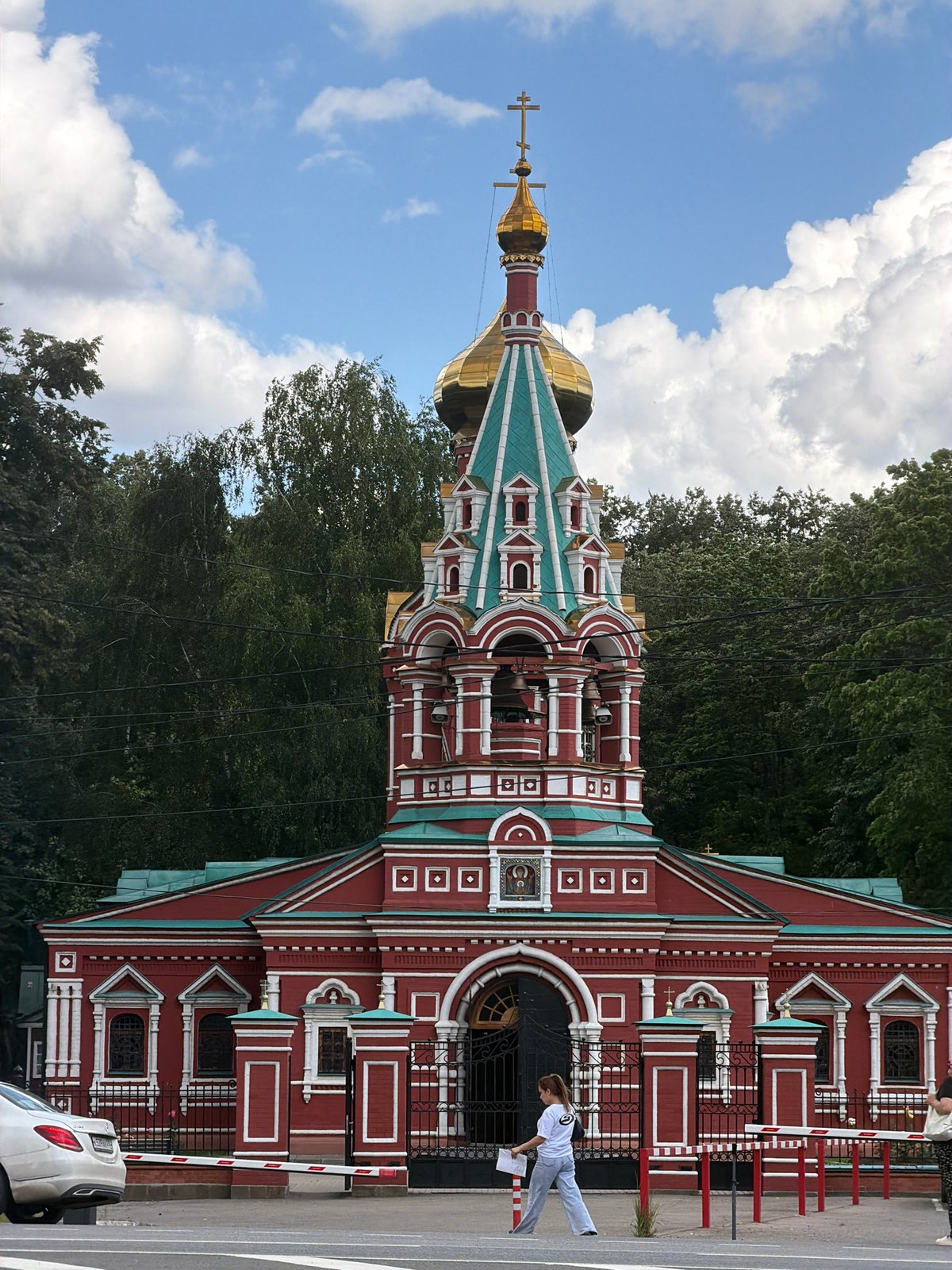 Orthodox church with gold dome stands bright in Krasnogorsk