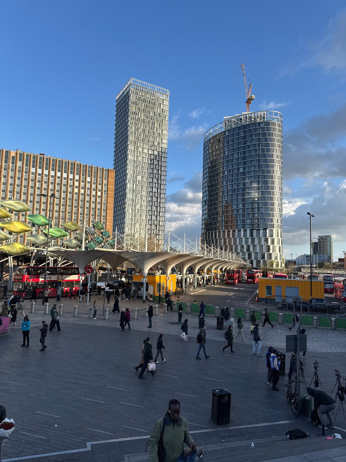 London urban scenes show bustling square and Stratford Station