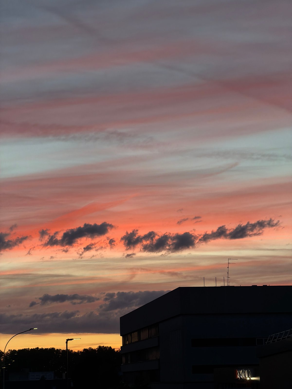 Dramatic sunset paints Strasbourg sky in vibrant colors