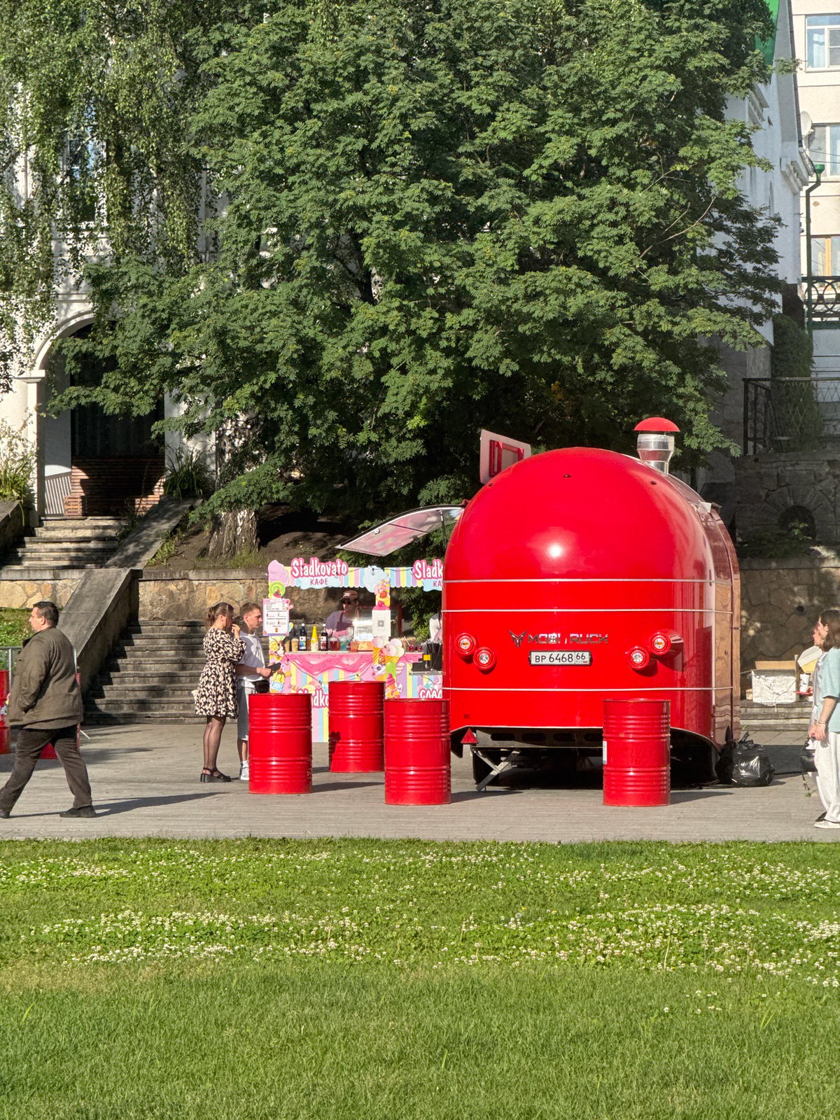 Yekaterinburg riverside in full summer swing — music, murals, and crowds