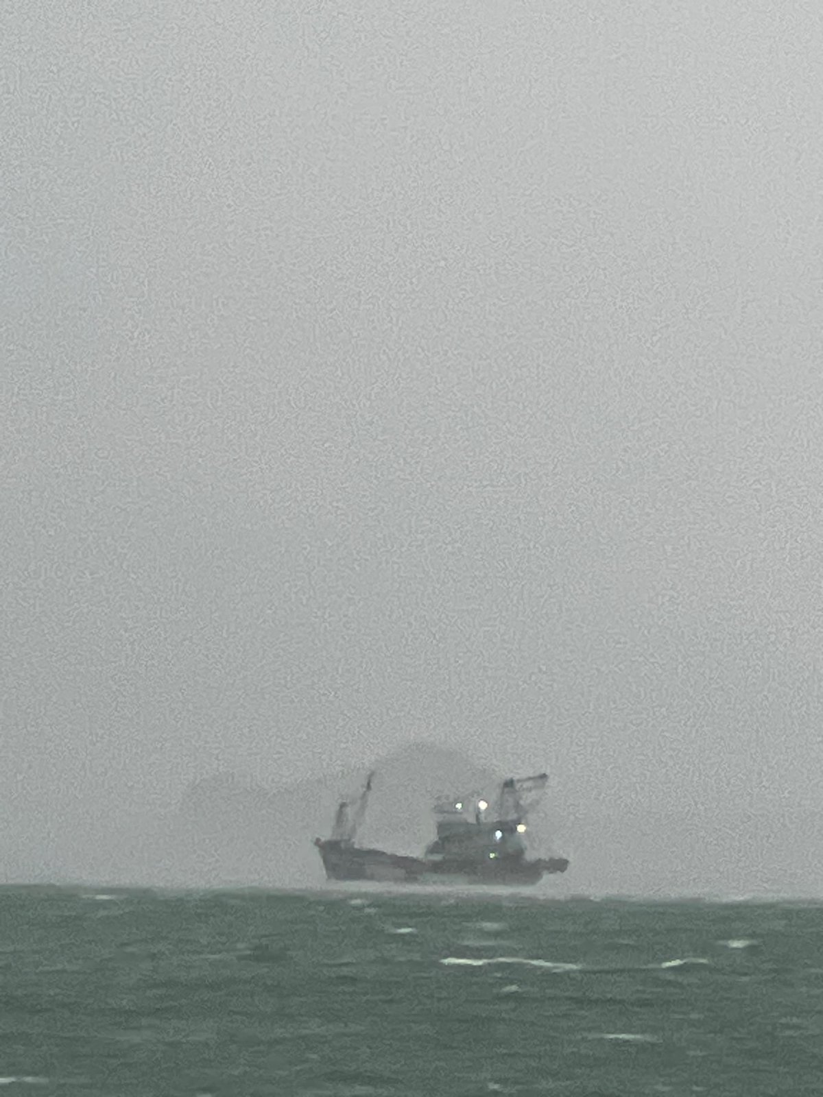 Catching a ferry from Don Sak amid stormy skies