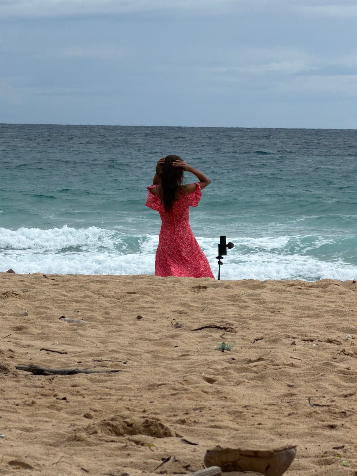 Solo tripod shoot on a Phuket beach in a red dress
