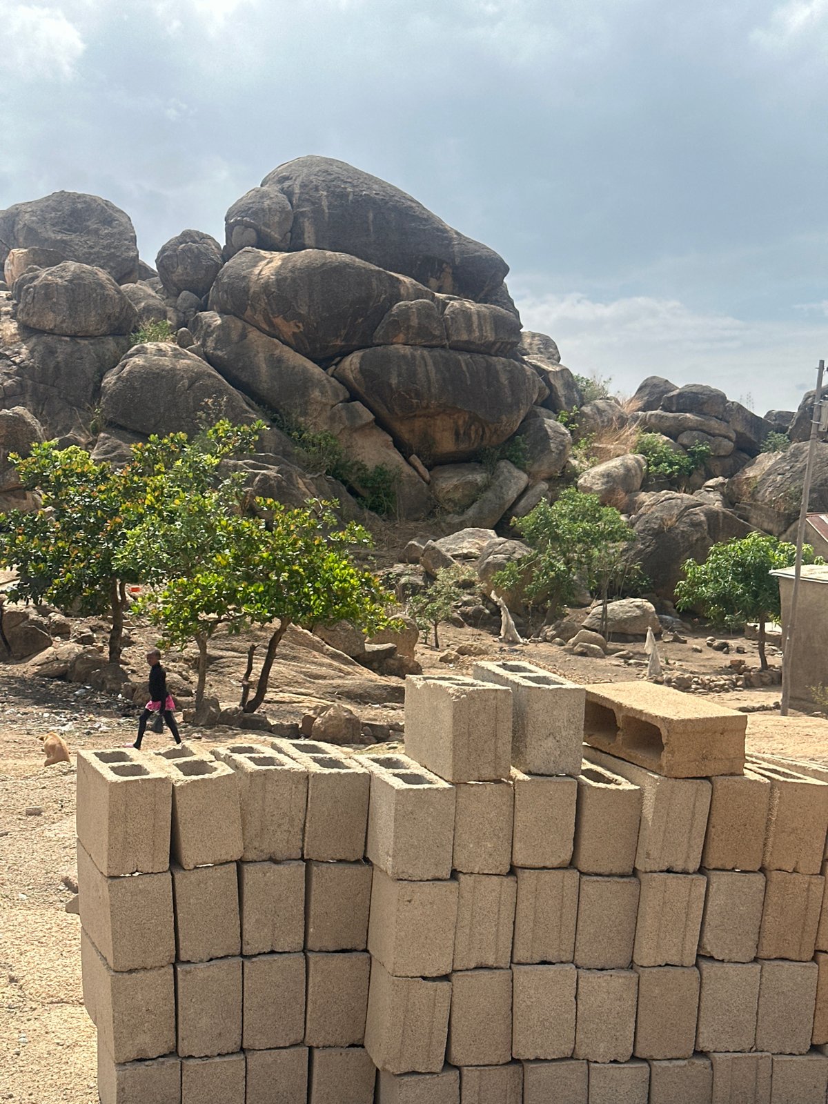Rocky landscape with green vegetation photographed in Jos, Nigeria