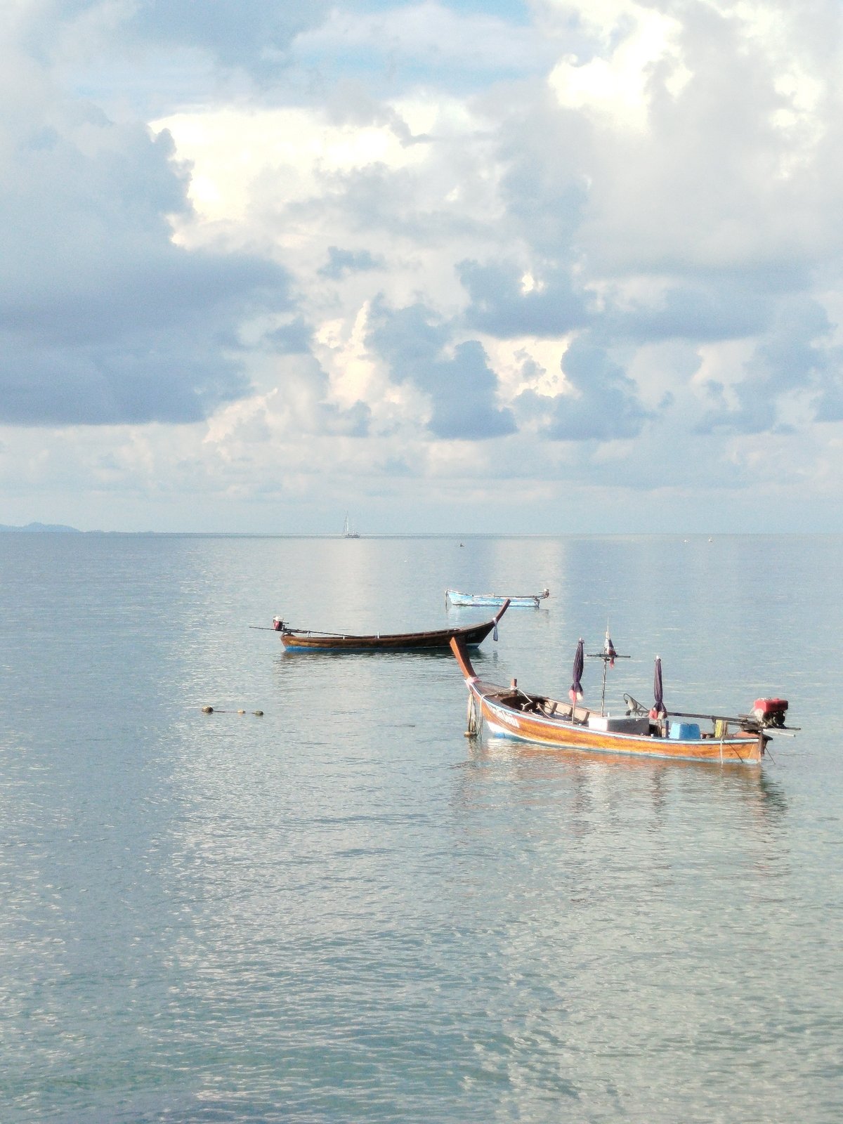 Early morning scenes from Rawai harbor and beach Thailand