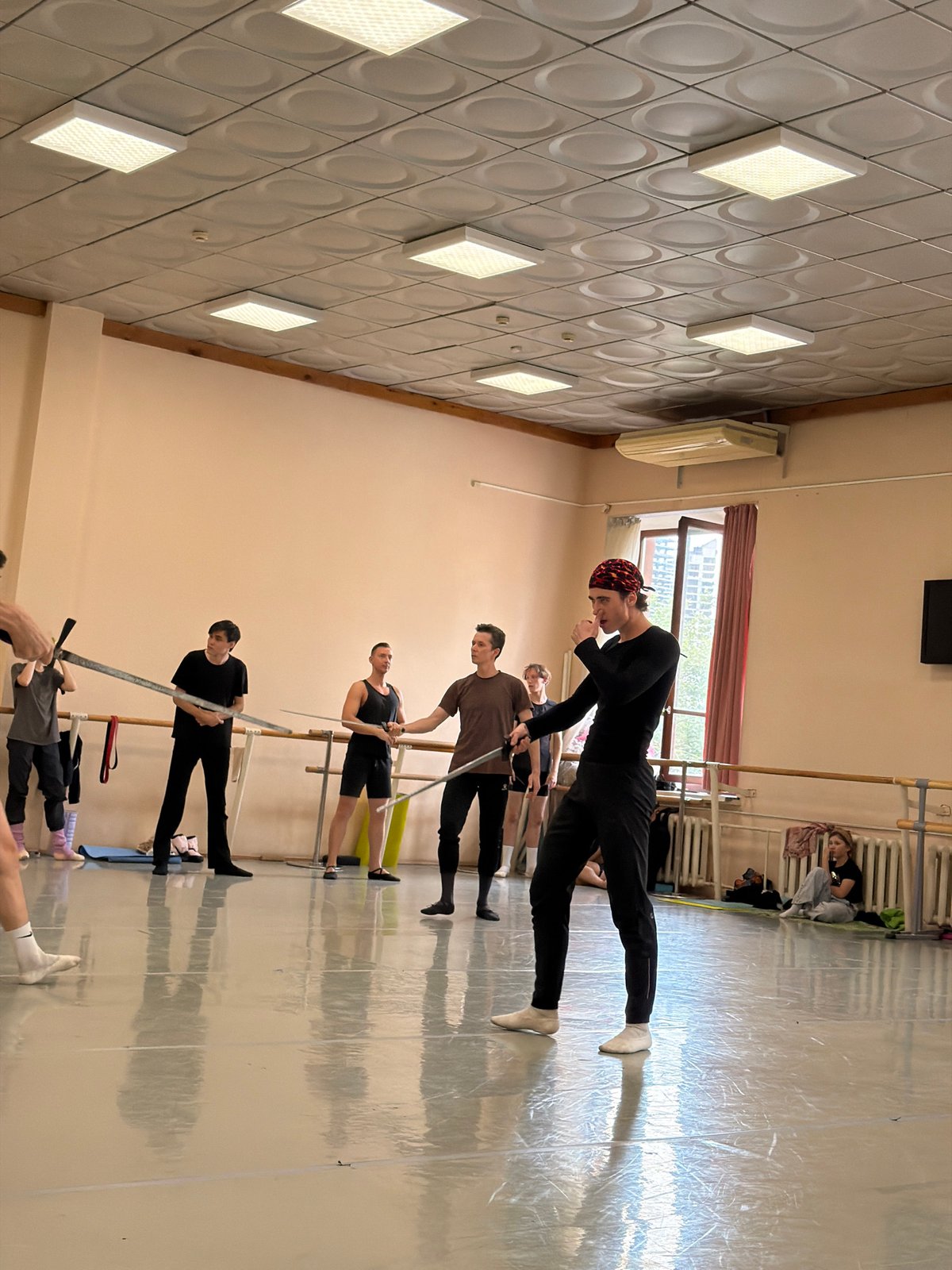 Sword fighting practice in a Ufa dance studio
