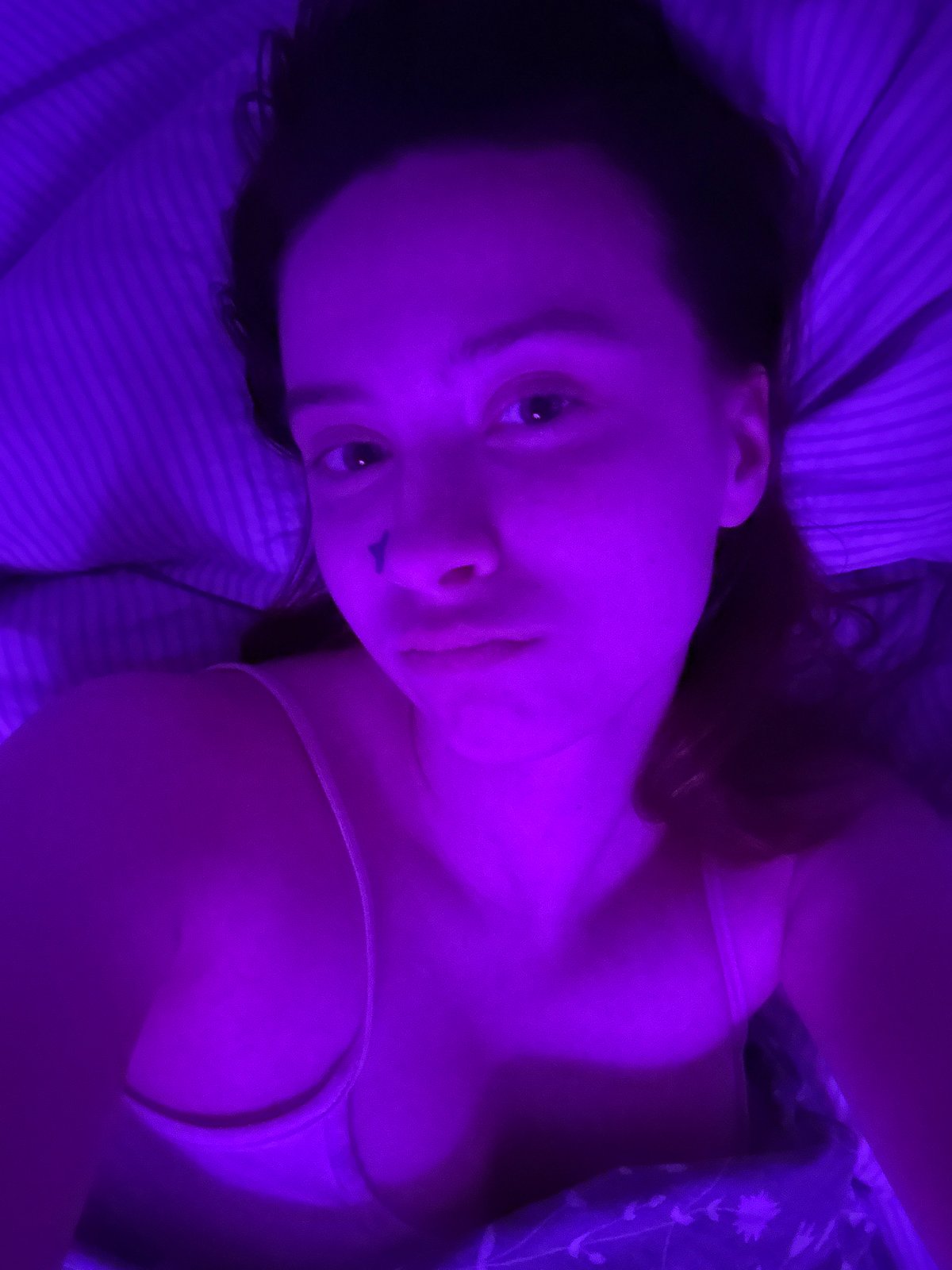 Woman documents personal moments with selfies and bedroom photos