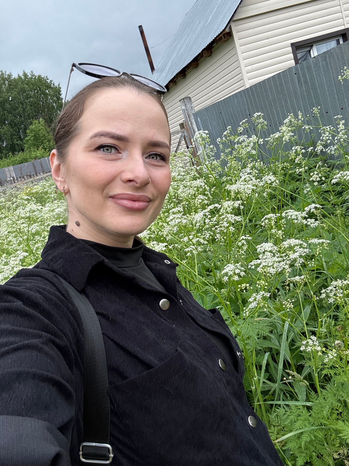 Woman documents rural walk through Rusalevka village, Russia