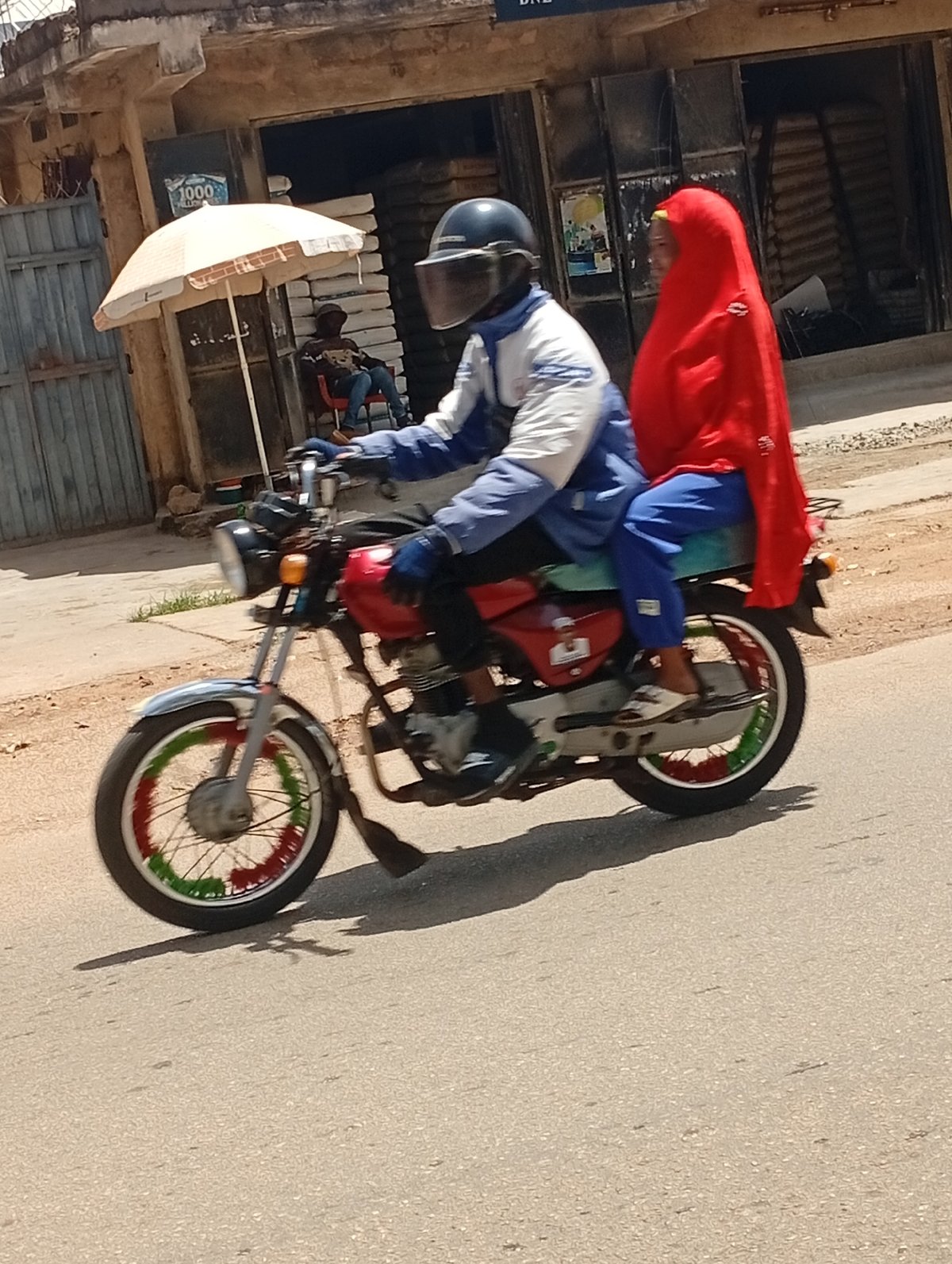 Street-level commercial life across Jos, Nigeria