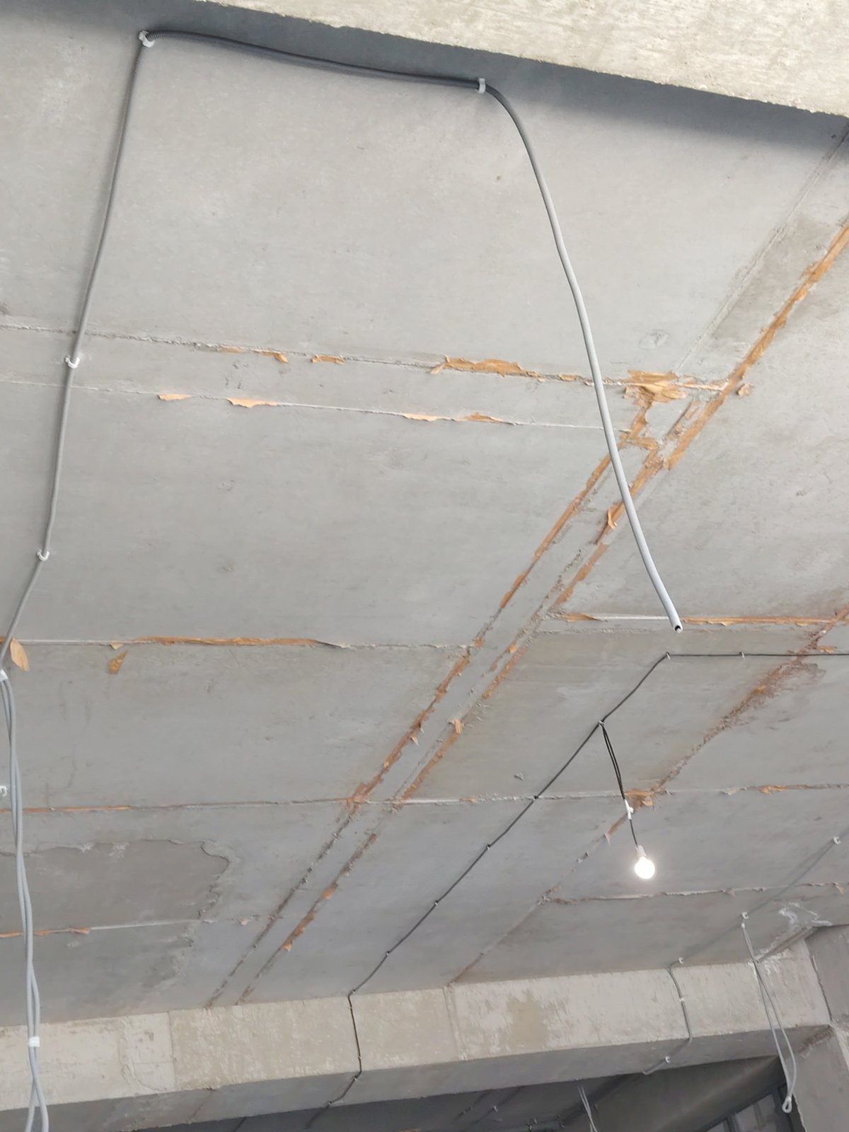 Armenian text displays and concrete ceiling documented in brief sequence