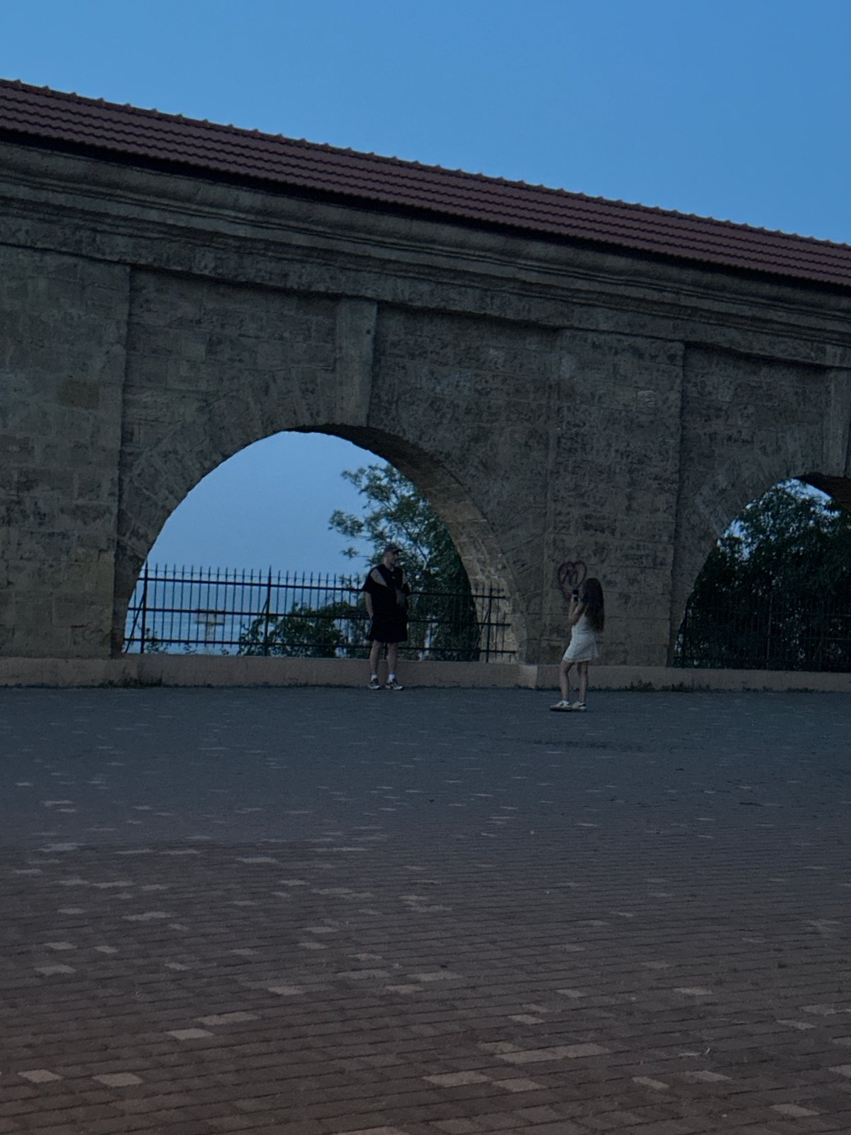 Evening stroll through a historic park and plaza in Odesa