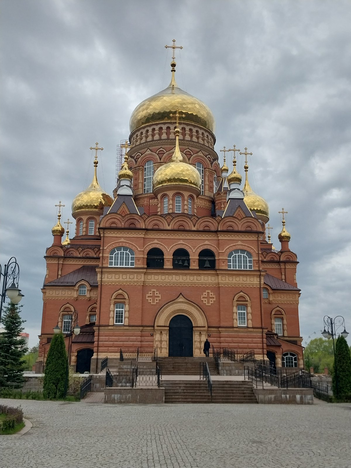 Orthodox churches documented in Orenburg, Russia under overcast skies