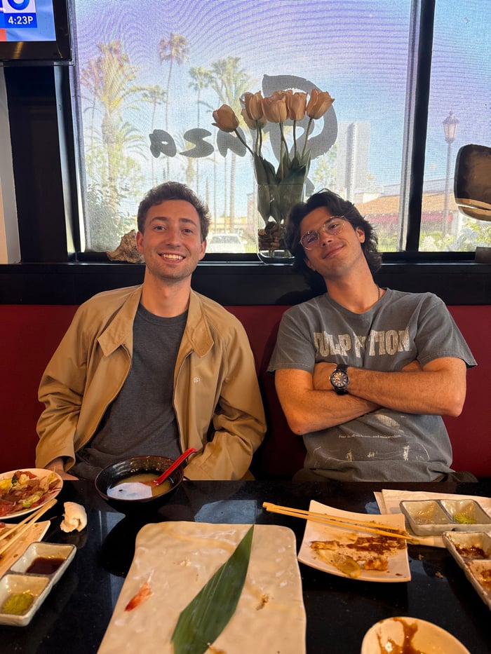 Two men dine at Lomita sushi restaurant