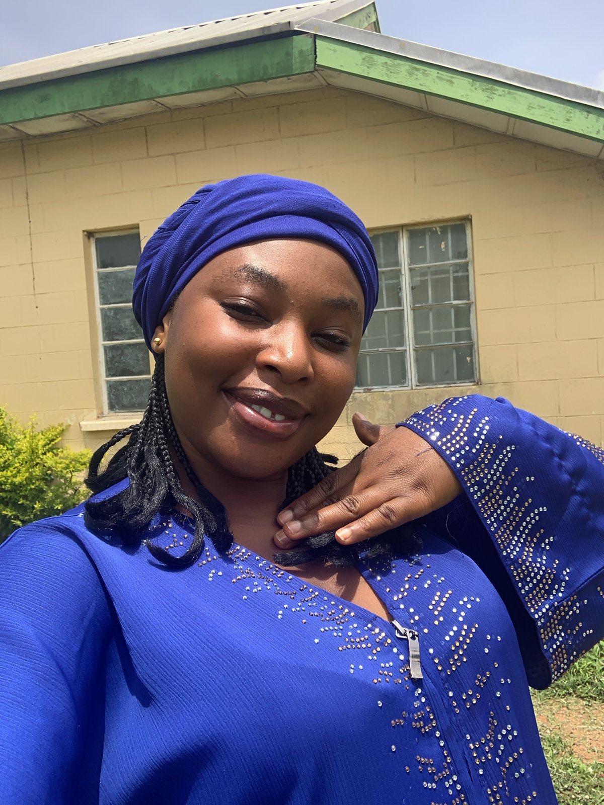 Outdoor moments in Jos: portraits, wildflowers, and crumbling concrete
