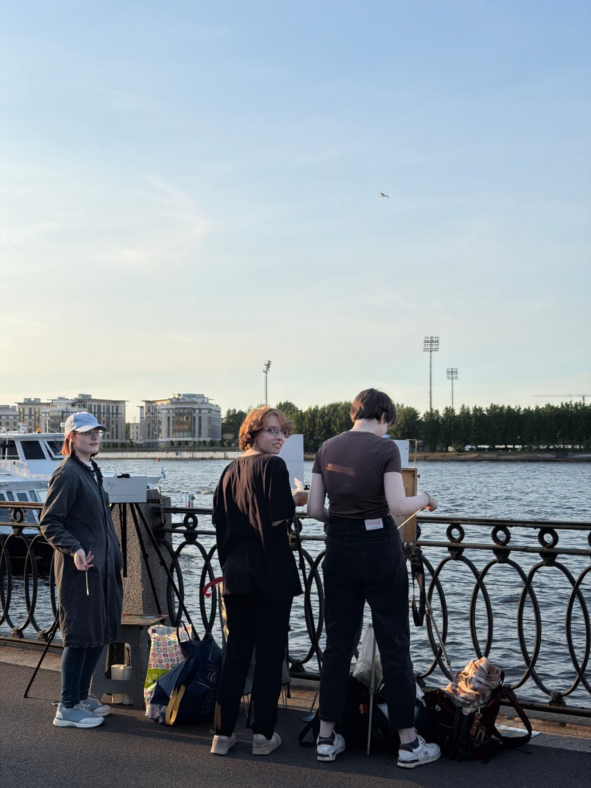 Young people gather at Saint Petersburg historic waterfront