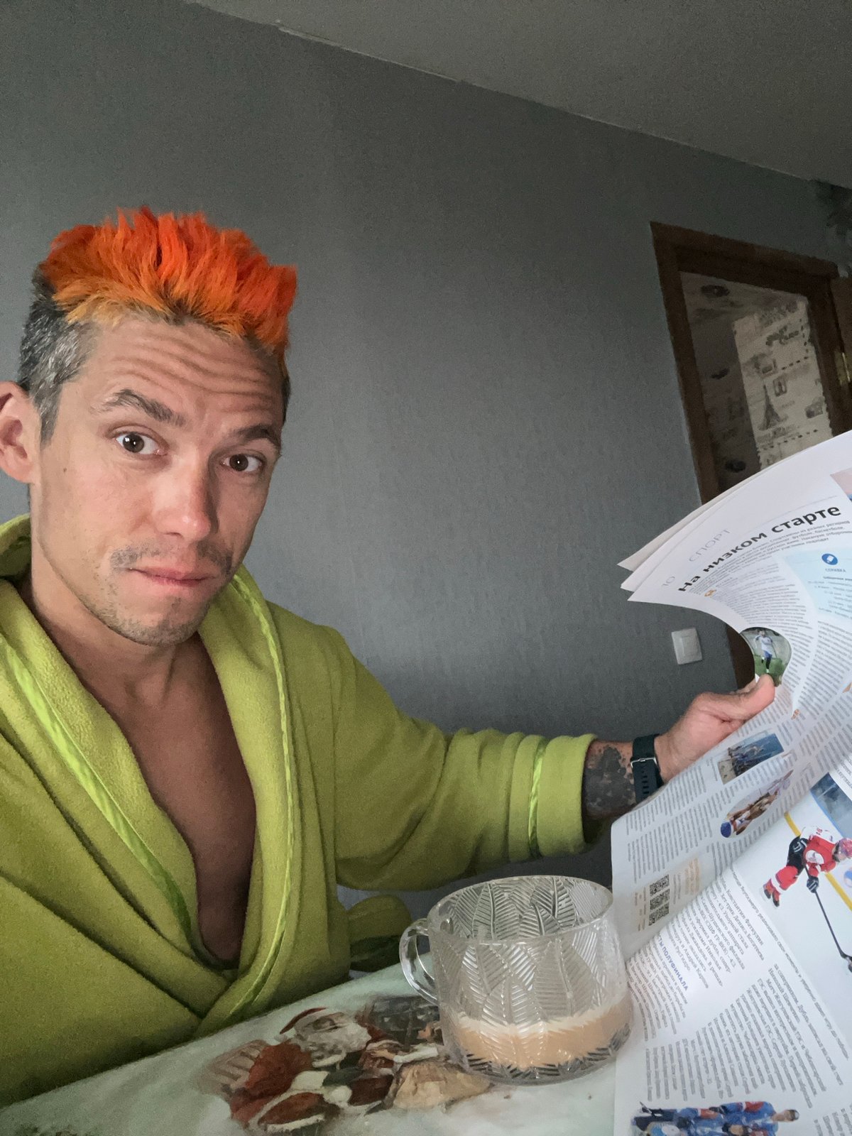 Man with orange-gray hair spotted reclining indoors in Chaikovsky