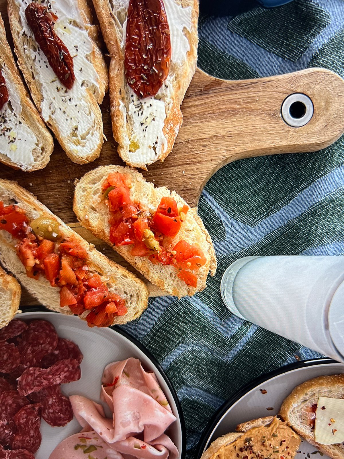 Sunday appetizer spread tagged for social media in Spain
