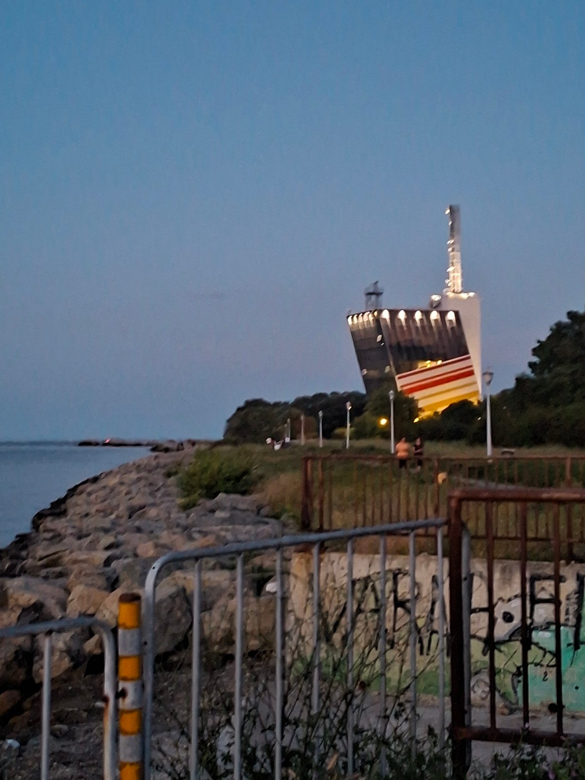 Varna's waterfront and skyline at dusk into night