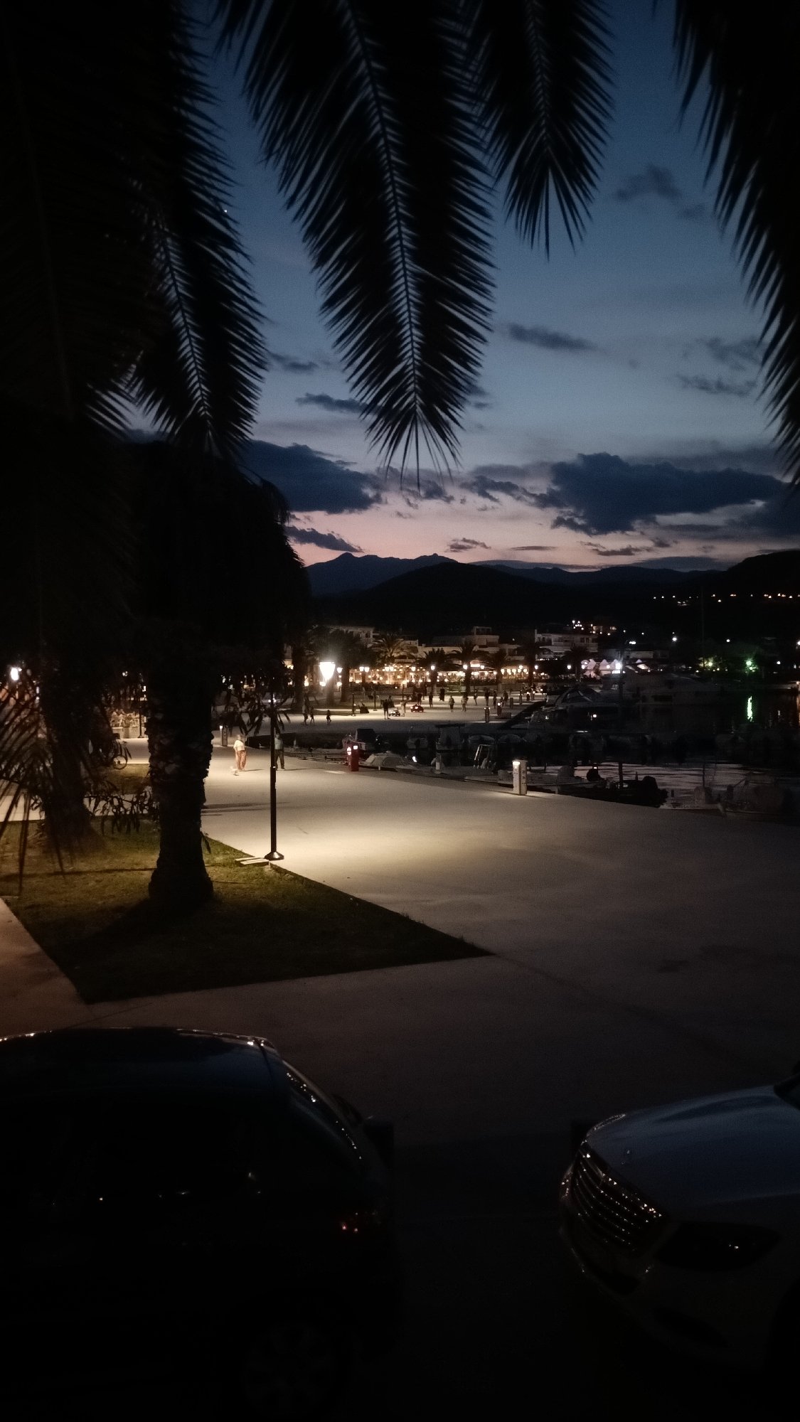Sunset to twilight along Nea Iraklitsa's harbor promenade