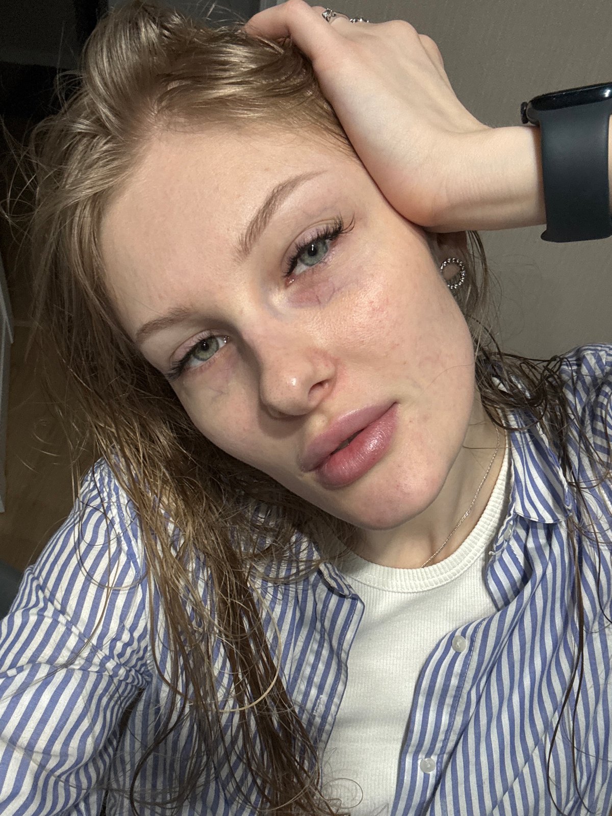 Woman photographed in kitchen setting in Perm, Russia