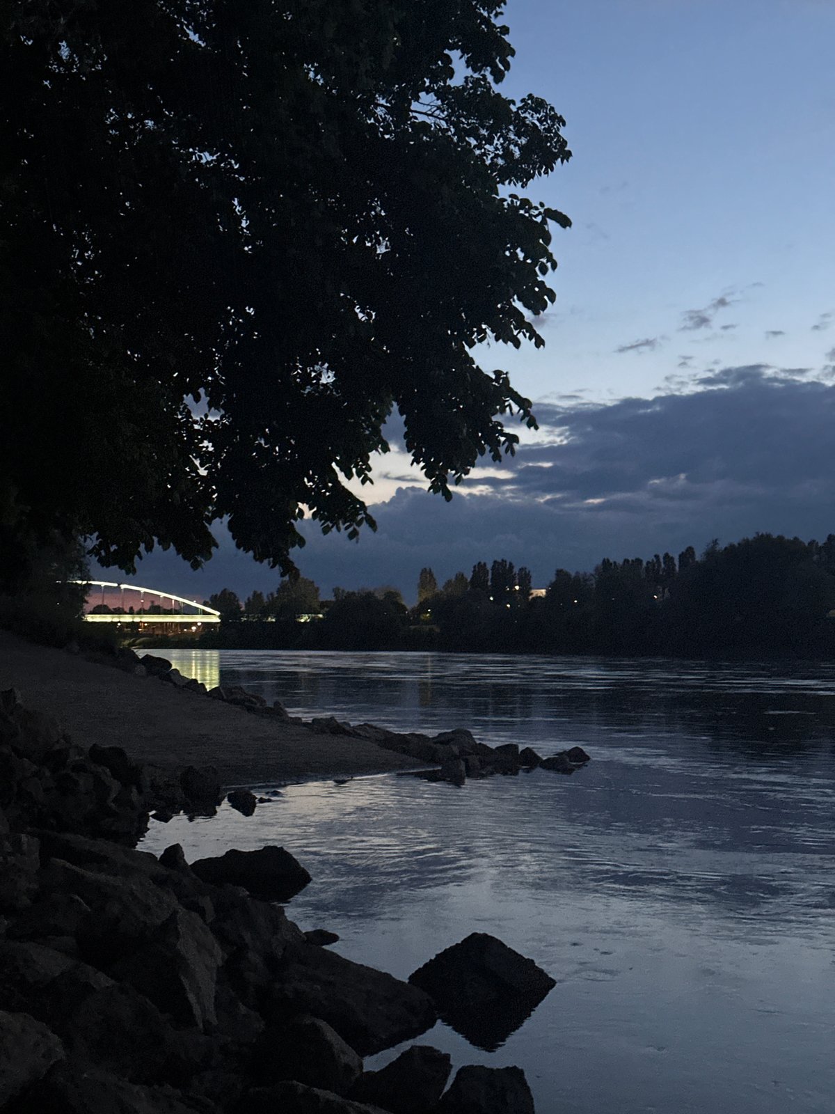 Dusk settles over Zagreb's Sava River, witnessed Saturday evening