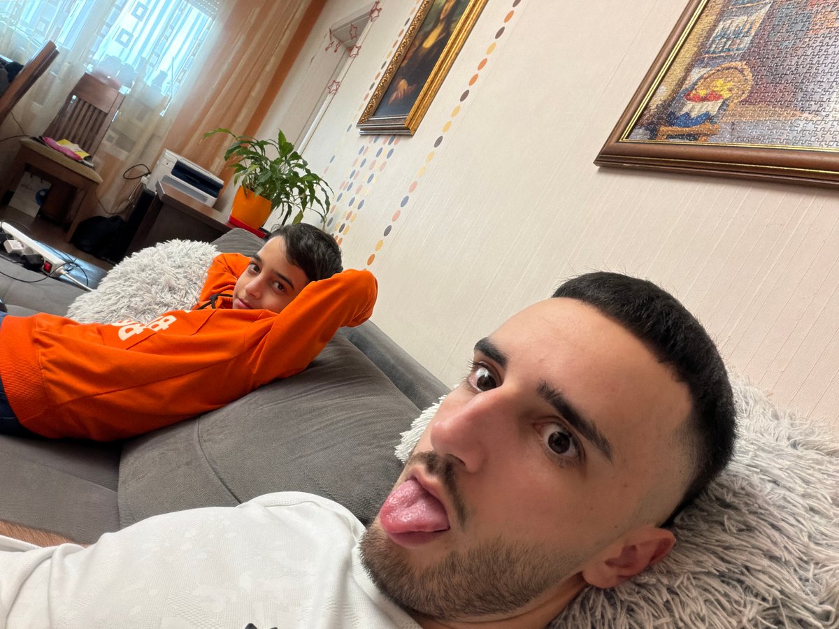 Adult and child captured in casual indoor moment in Plovdiv