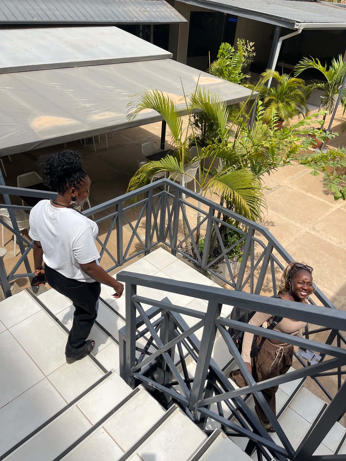 Casual portraits captured in modern Abuja building complex