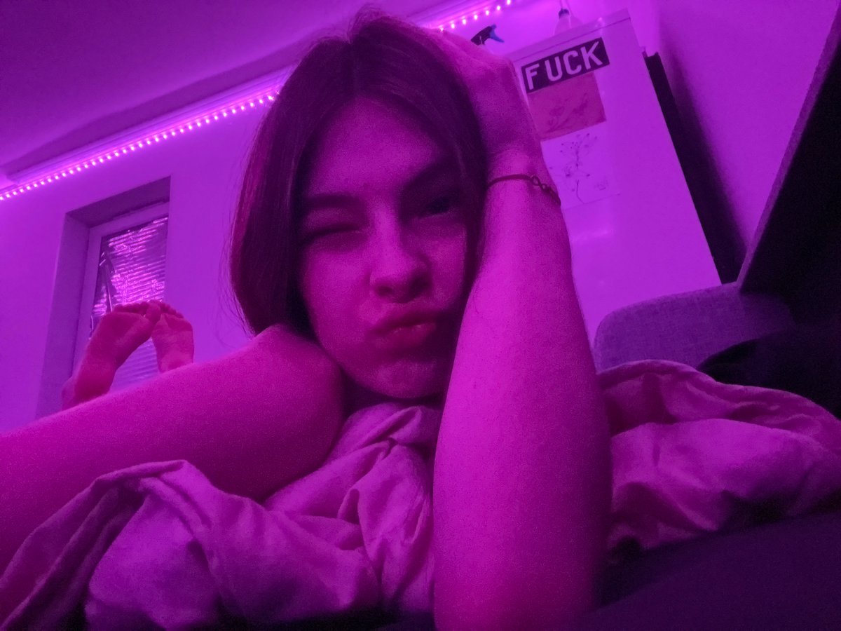 Young woman documents quiet evening with cat in Saint Petersburg
