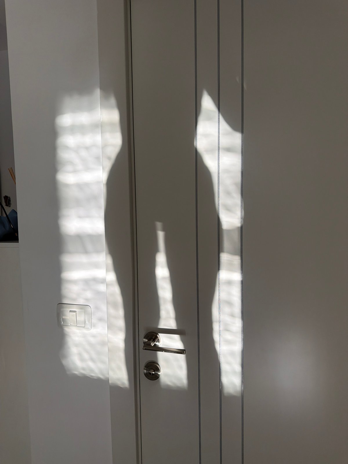 Morning light inside and outside a Bat Yam apartment