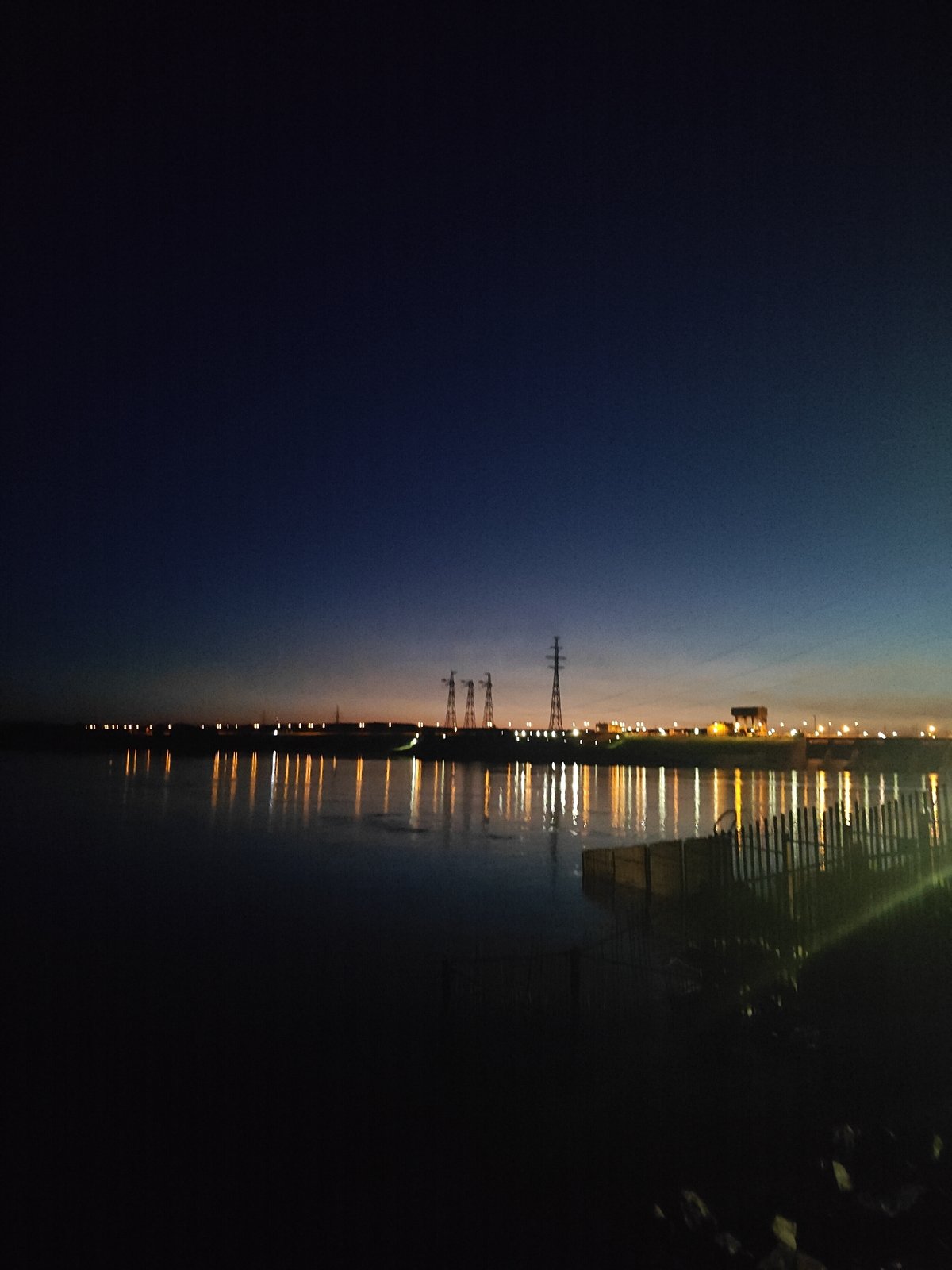 Evening waterfront scenes documented in Chaikovsky, Russia