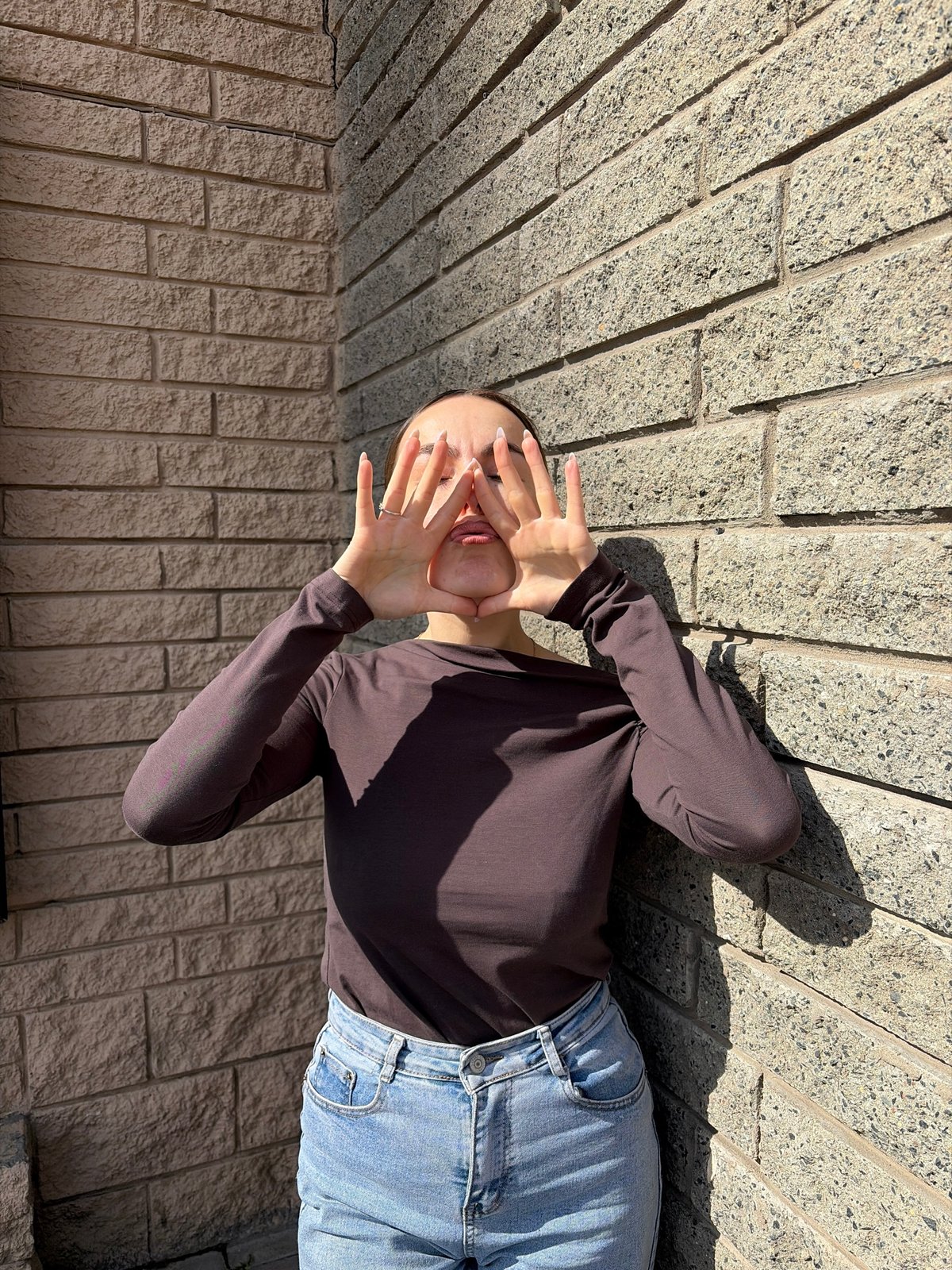 Woman photographed at multiple Izhevsk locations during morning session