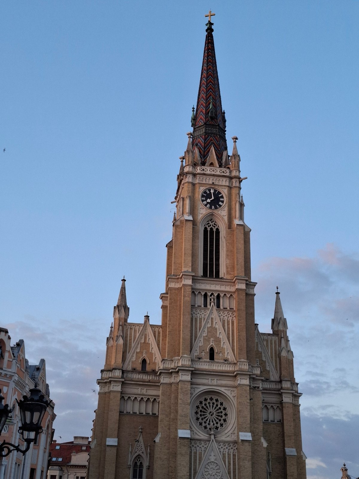 Tourist documents churches, toys, monuments in Novi Sad afternoon