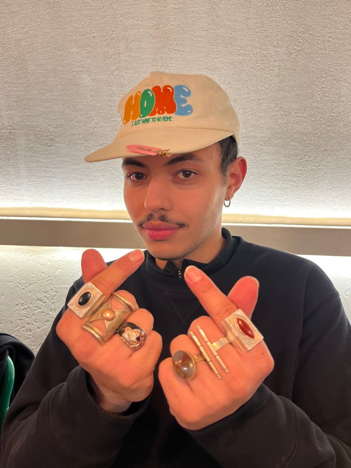 Evening dining gathering documented across Paris restaurant venue