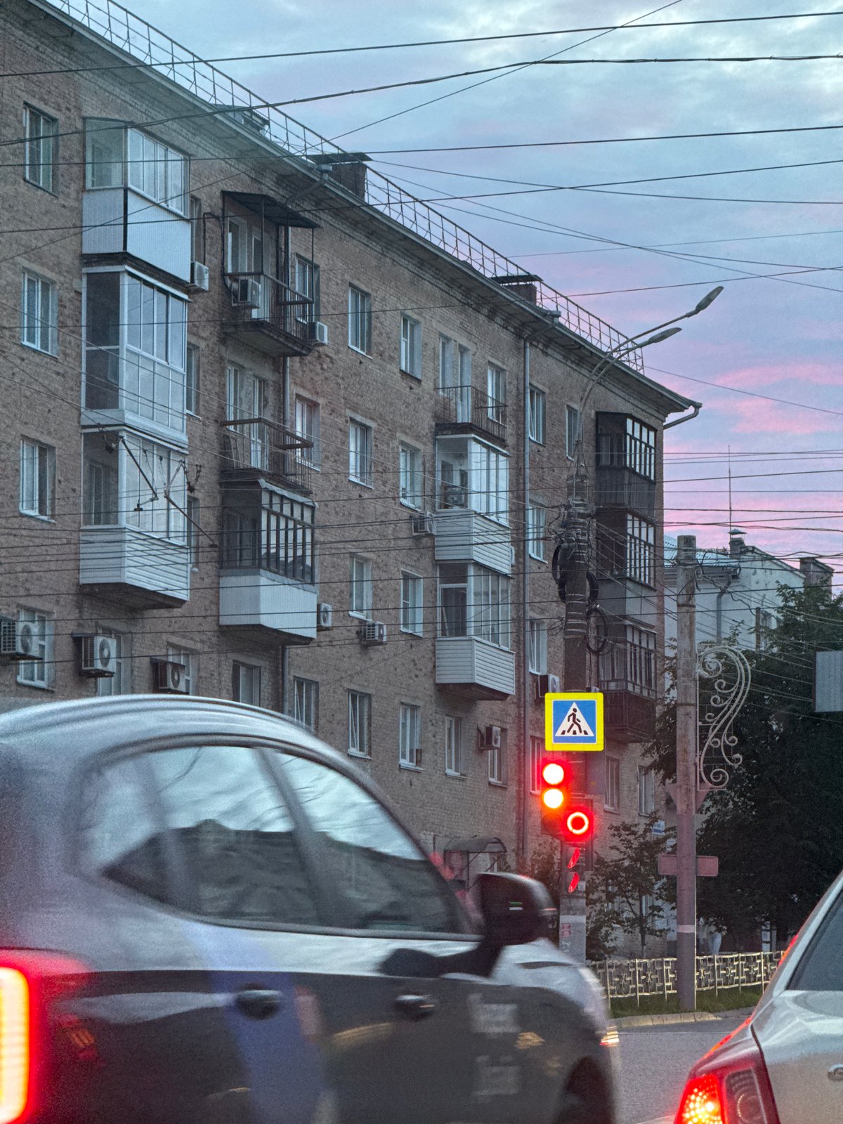 Evening drive through Izhevsk's Soviet-era streets at dusk