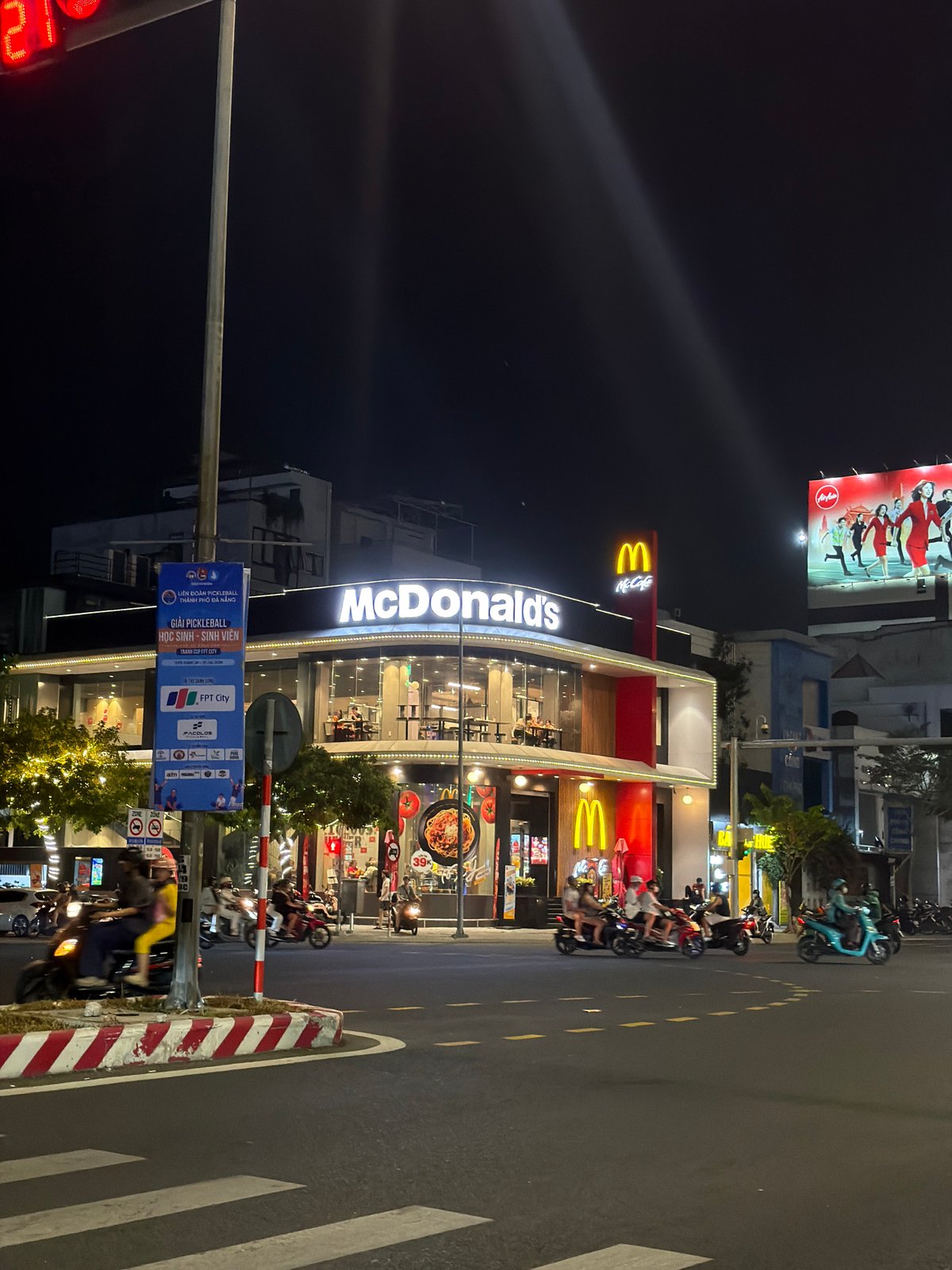 Dragon Bridge district alive with lights on a Da Nang night