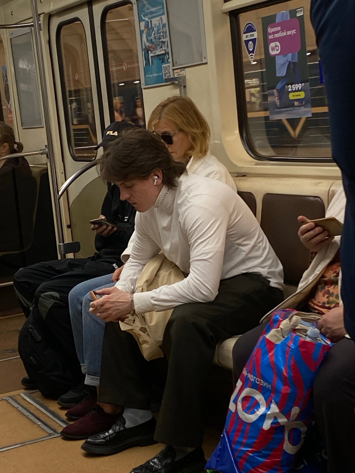 Everyday street life documented across Saint Petersburg plazas and metro