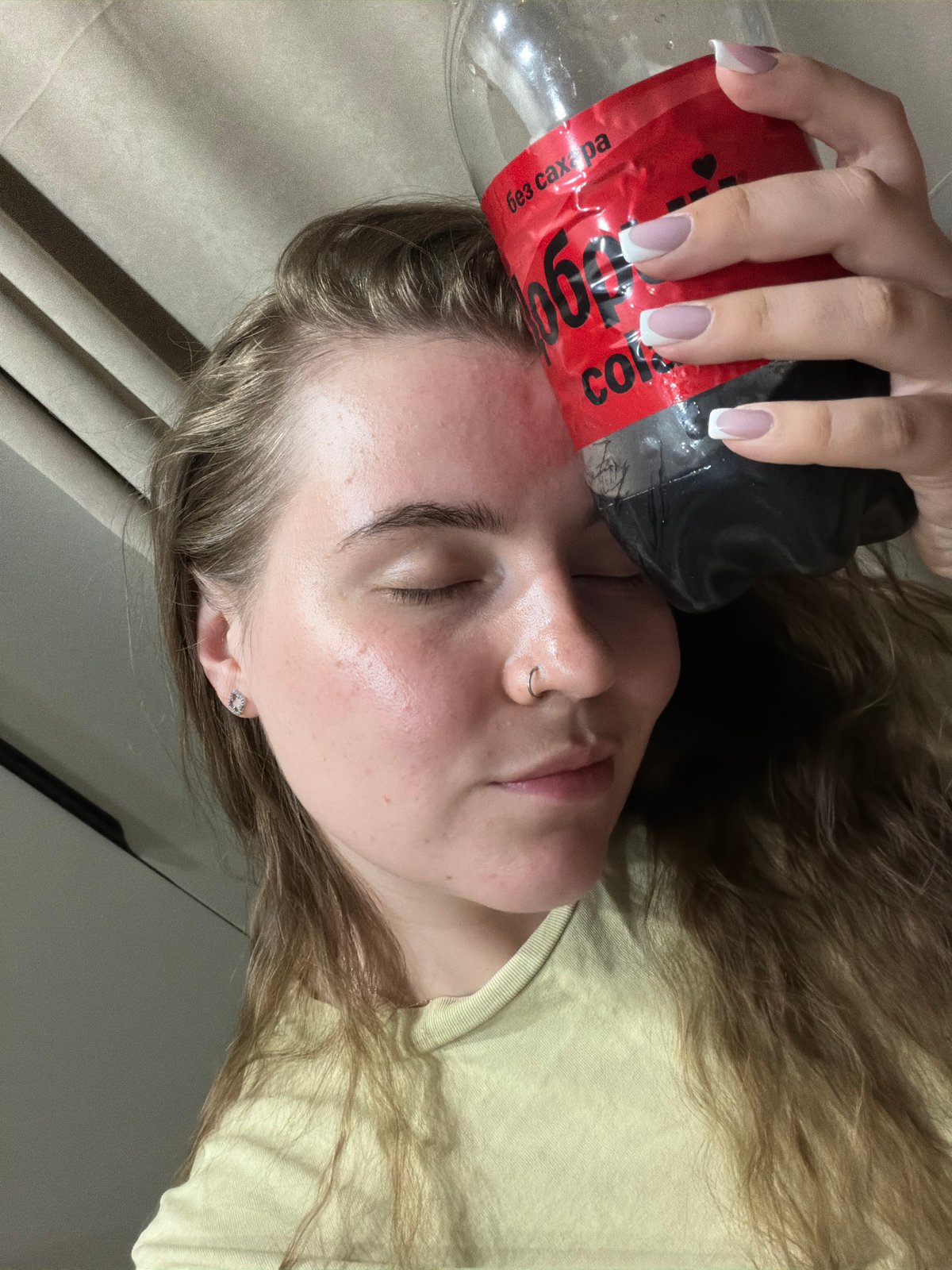 Woman photographed in casual indoor moments in Chaikovsky, Russia